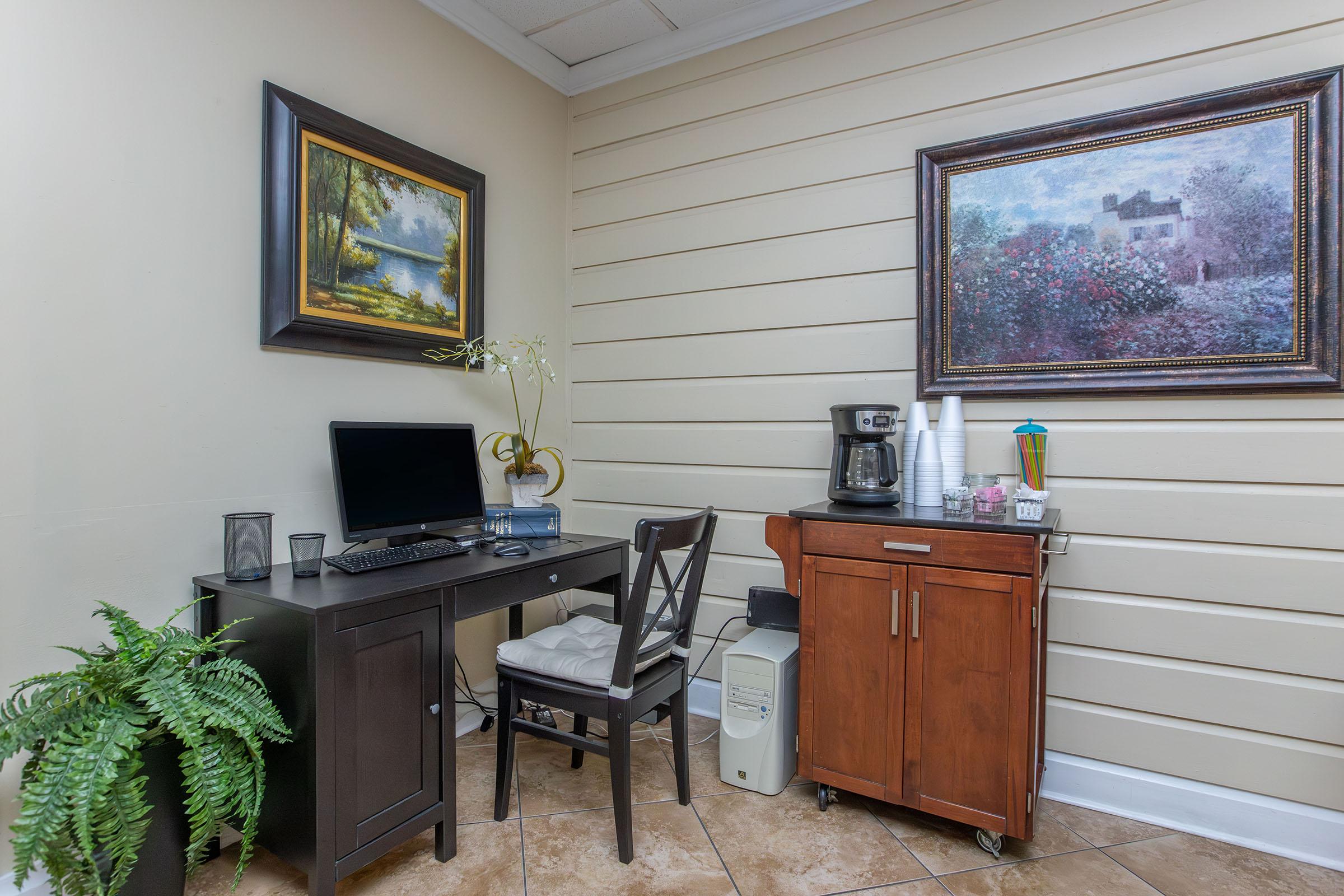 a living room filled with furniture and a tv