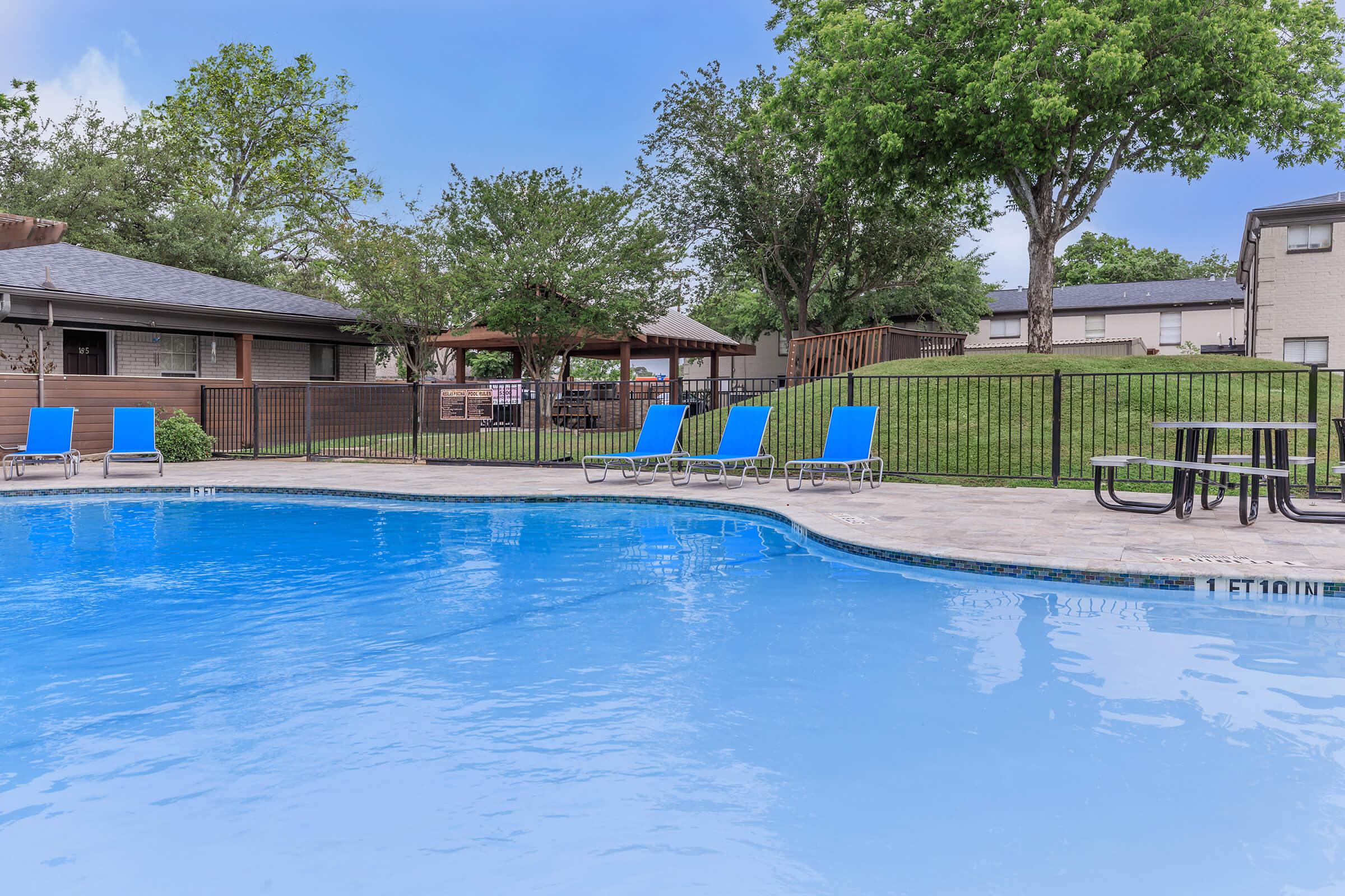 a house with a large pool of water