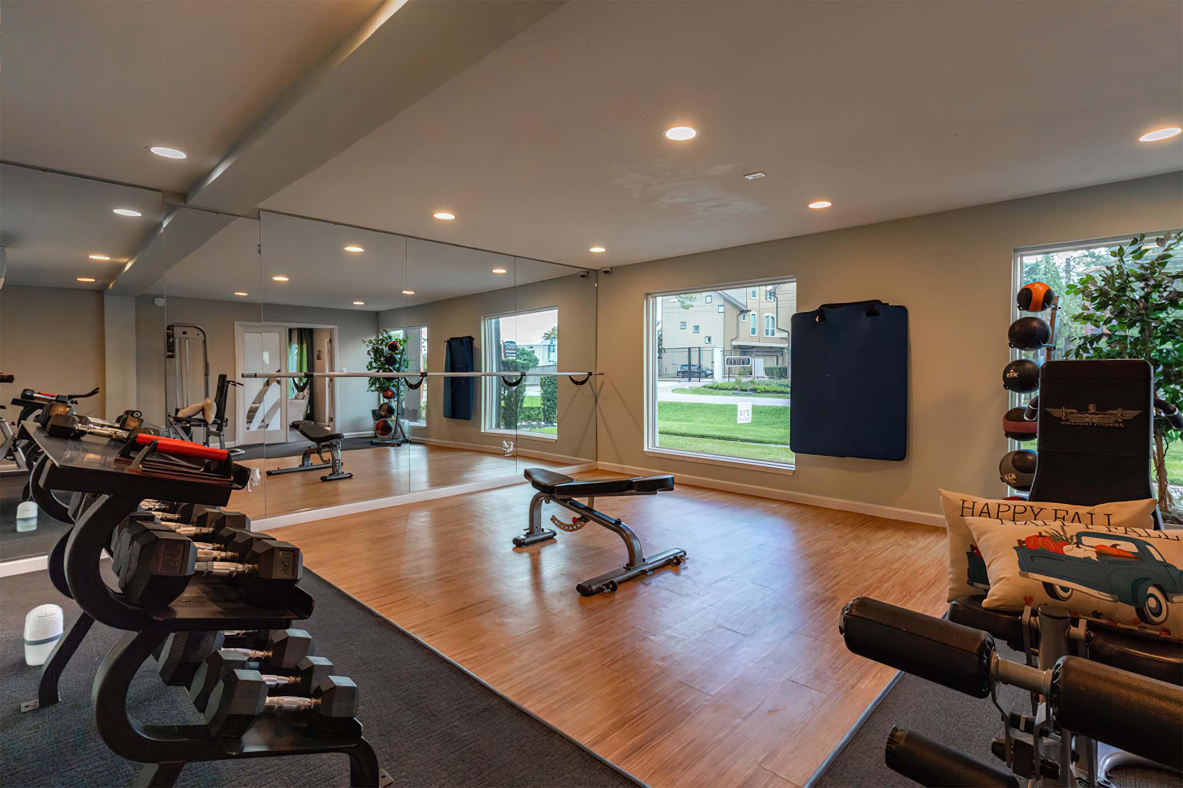 a living room filled with furniture and a large window