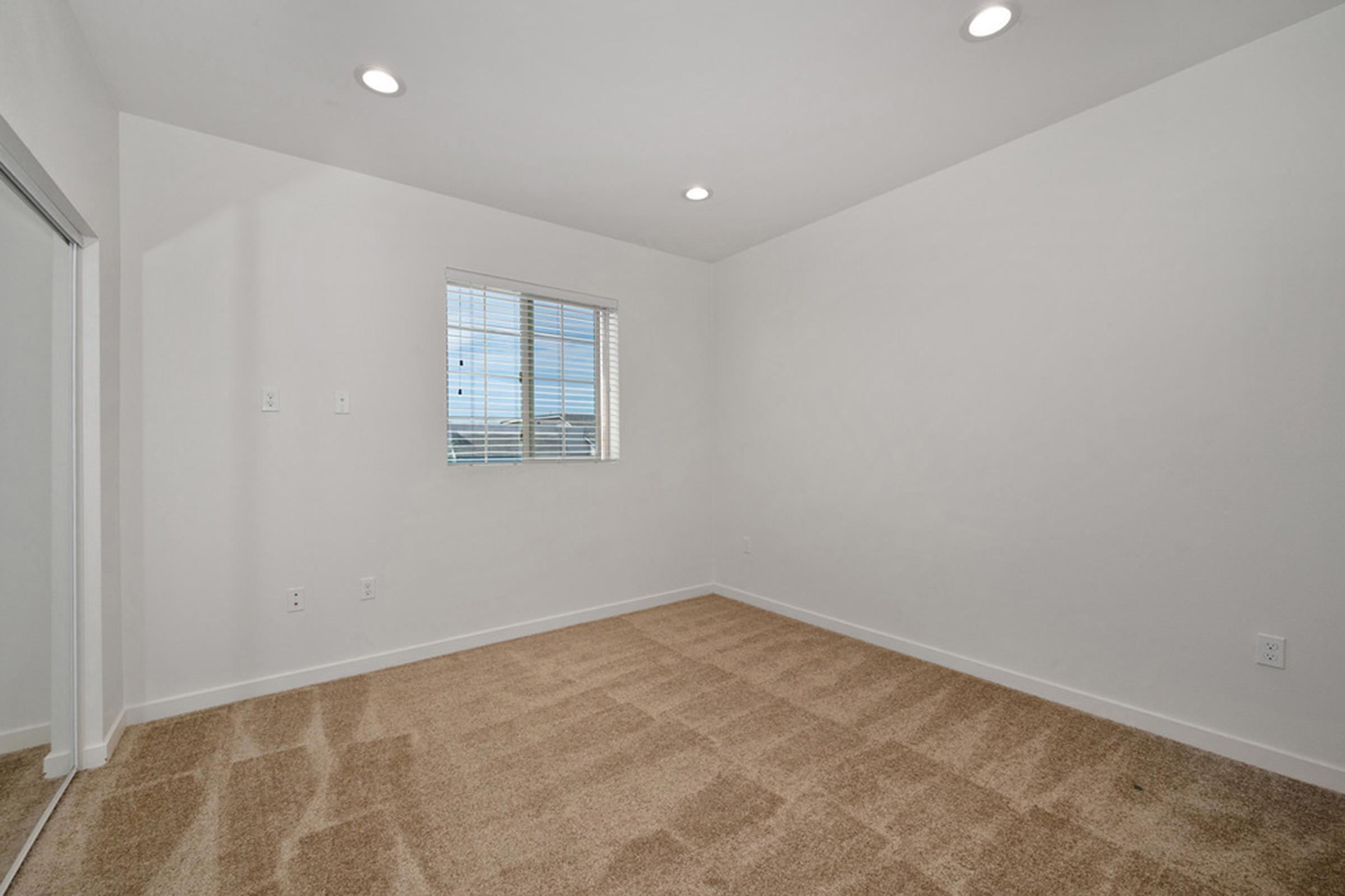 a large empty bedroom