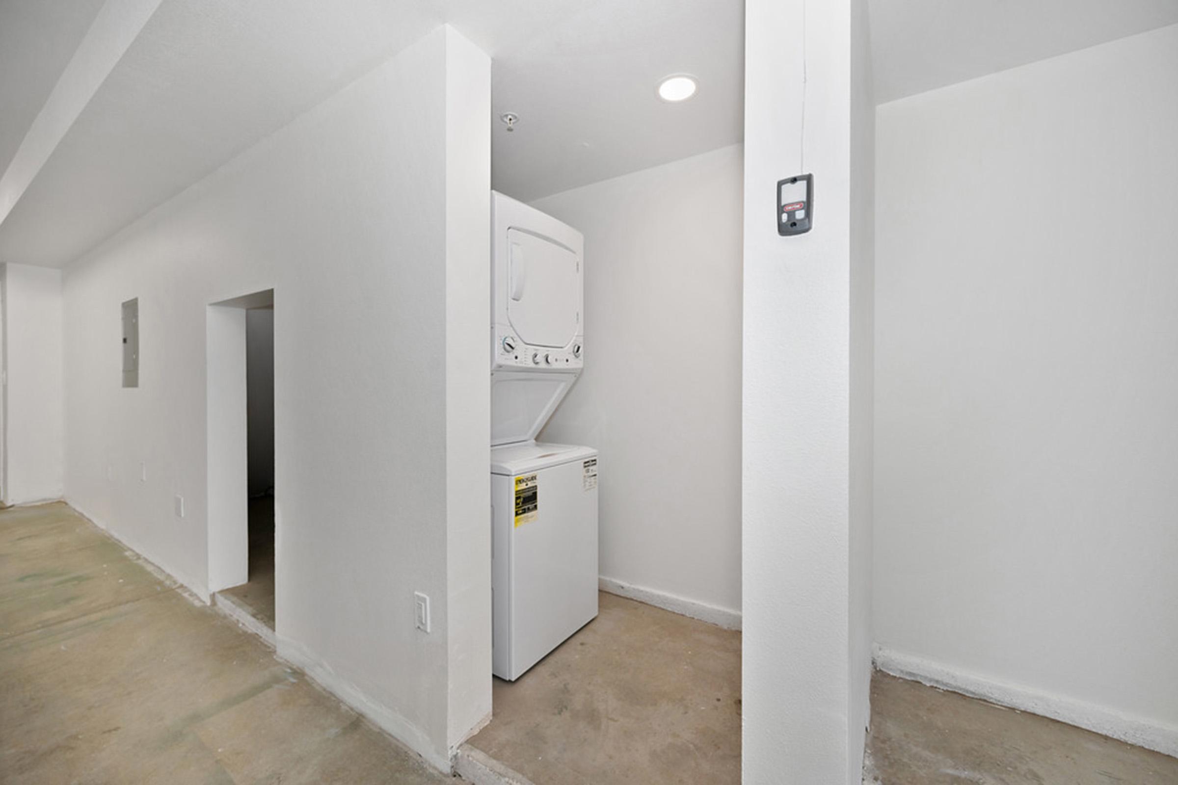 view of a washer and dryer in a garage