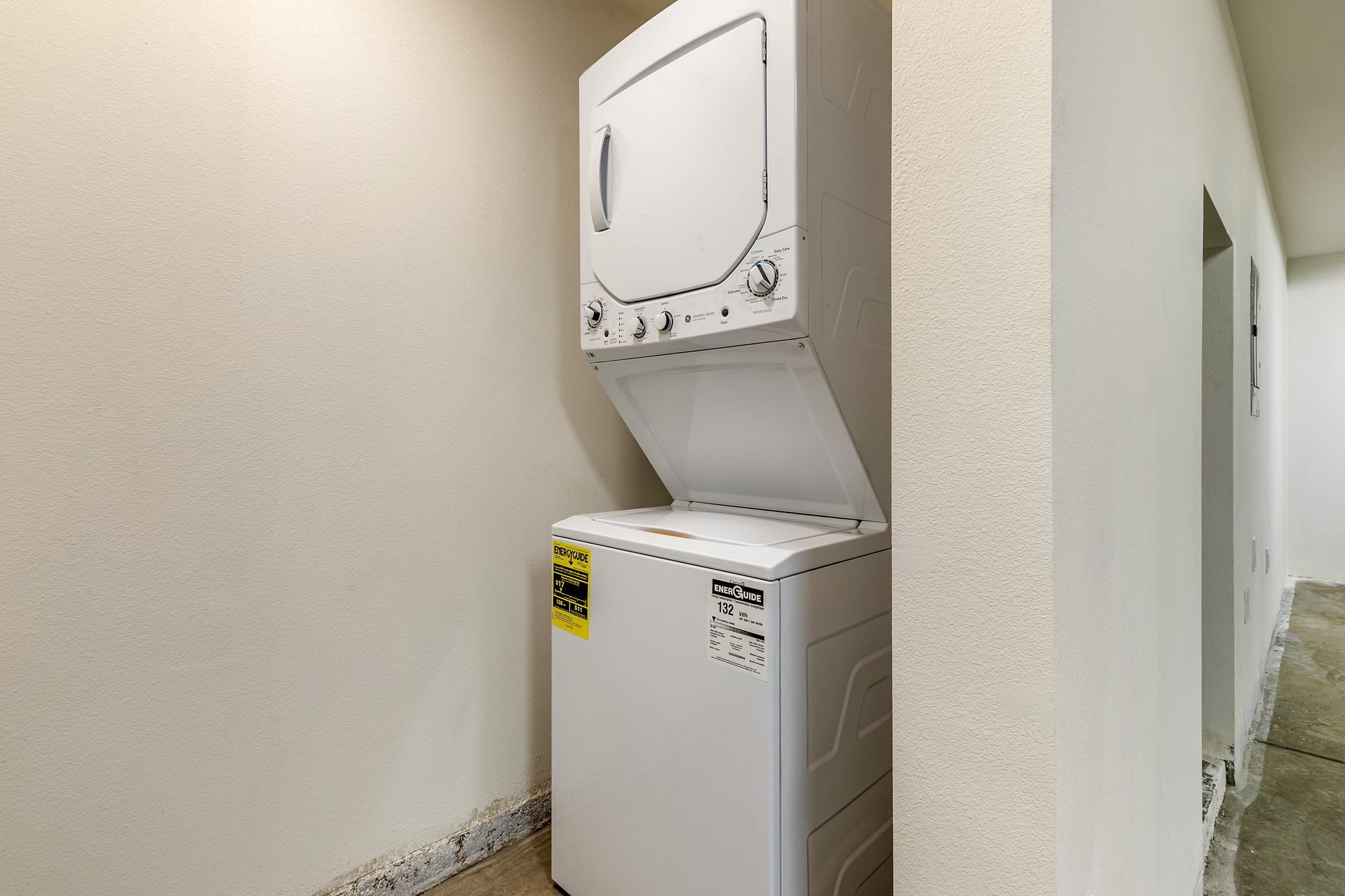 a view of a stackable washer and dryer