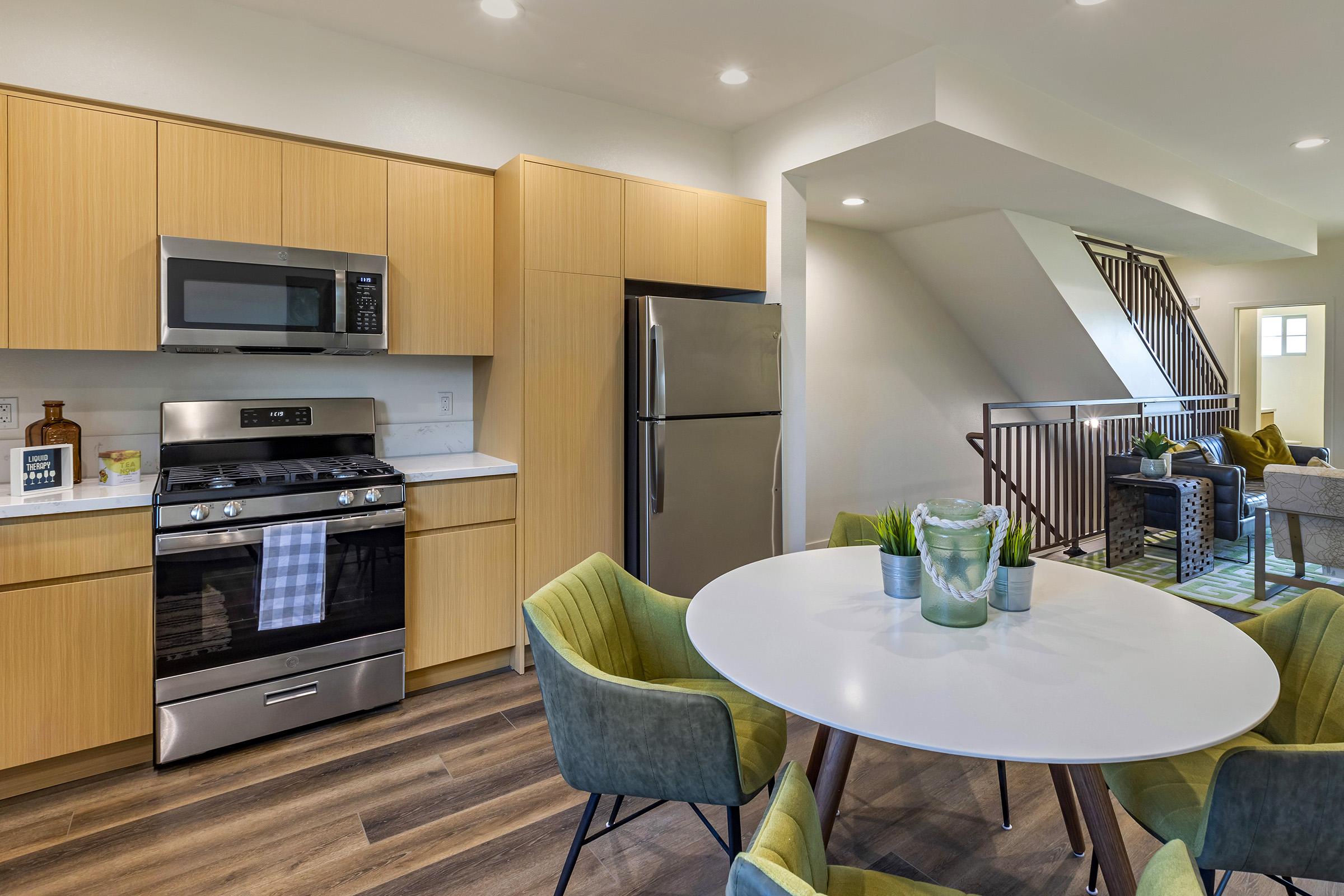 a dining room table in a kitchen