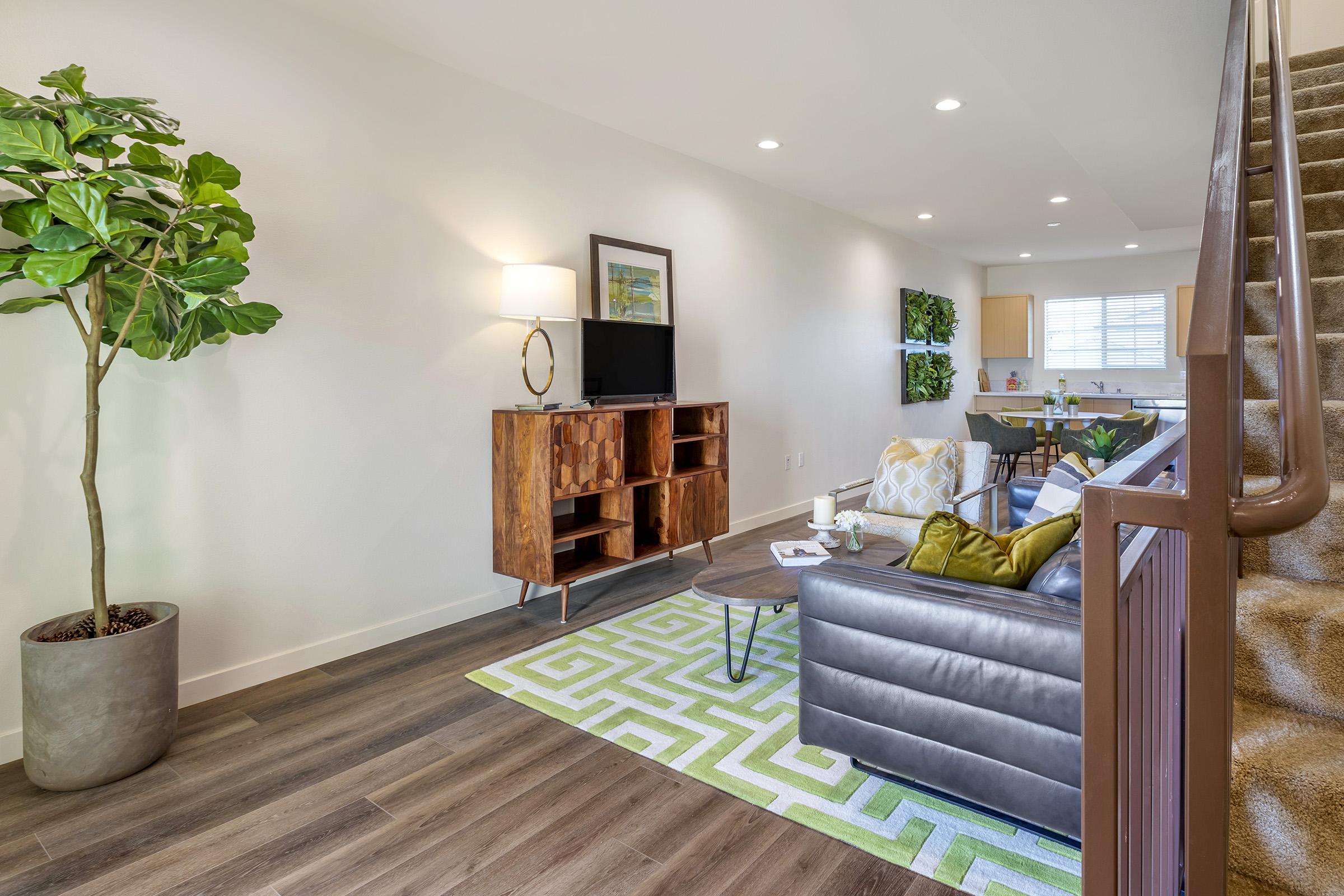 a living room with a couch and tv