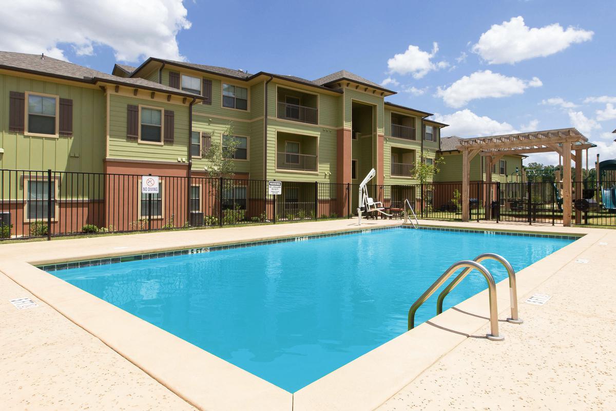 a pool of water in front of a building