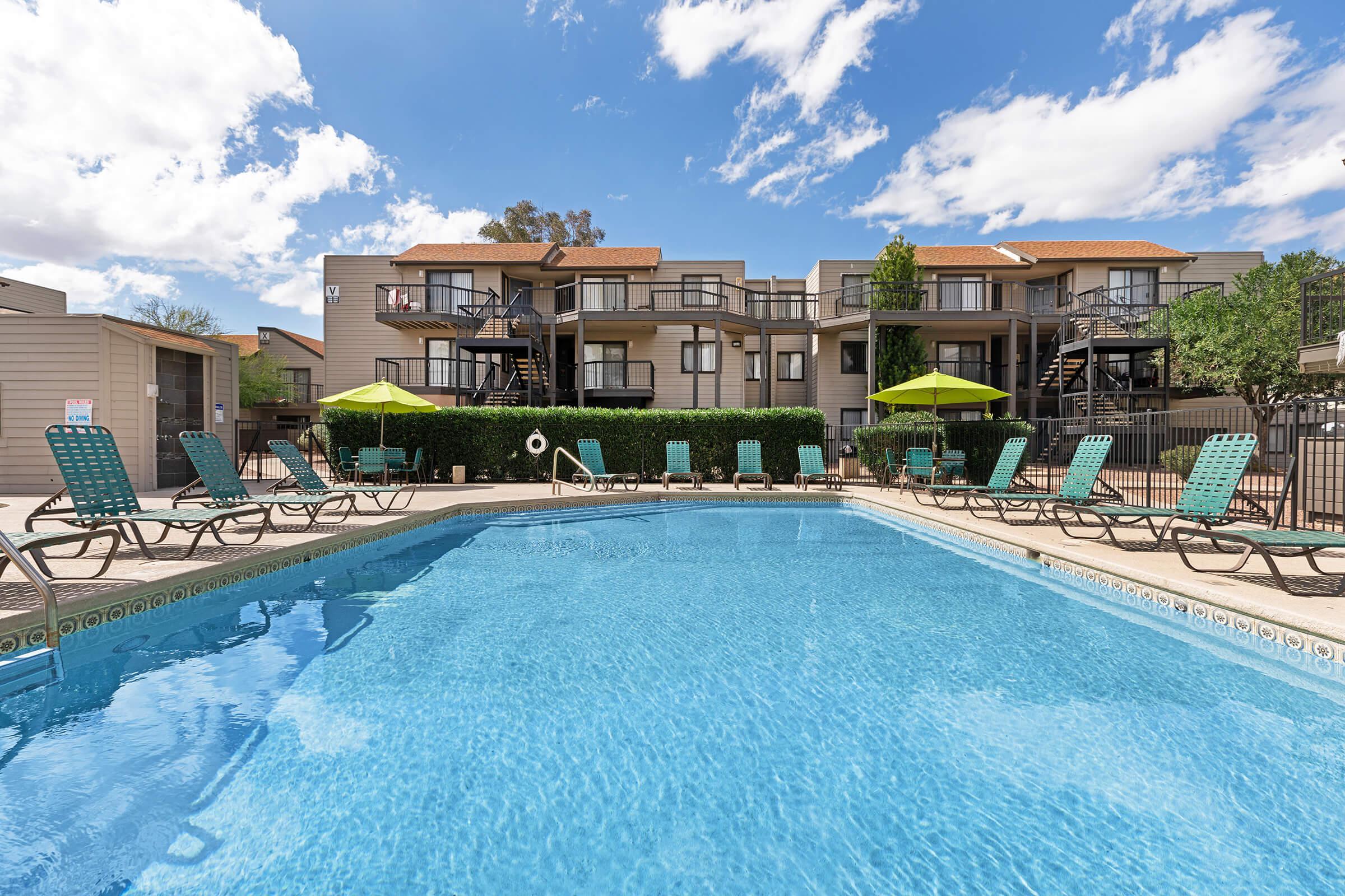 a pool next to a building