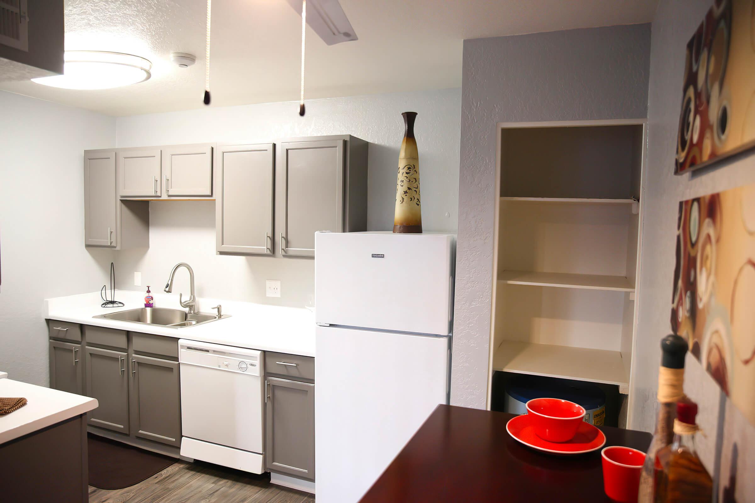 a kitchen with a table in a room