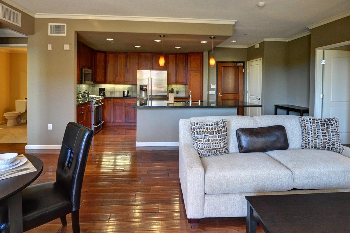 a living room filled with furniture and a fire place