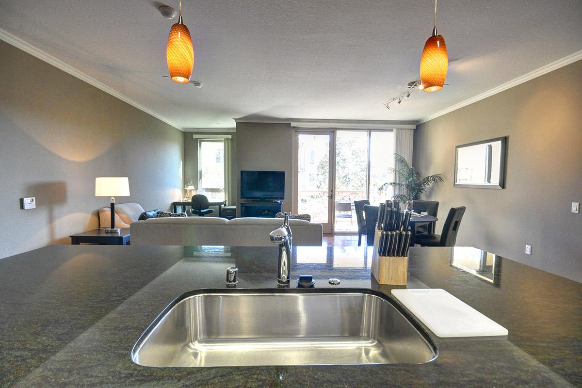 a modern kitchen with stainless steel appliances