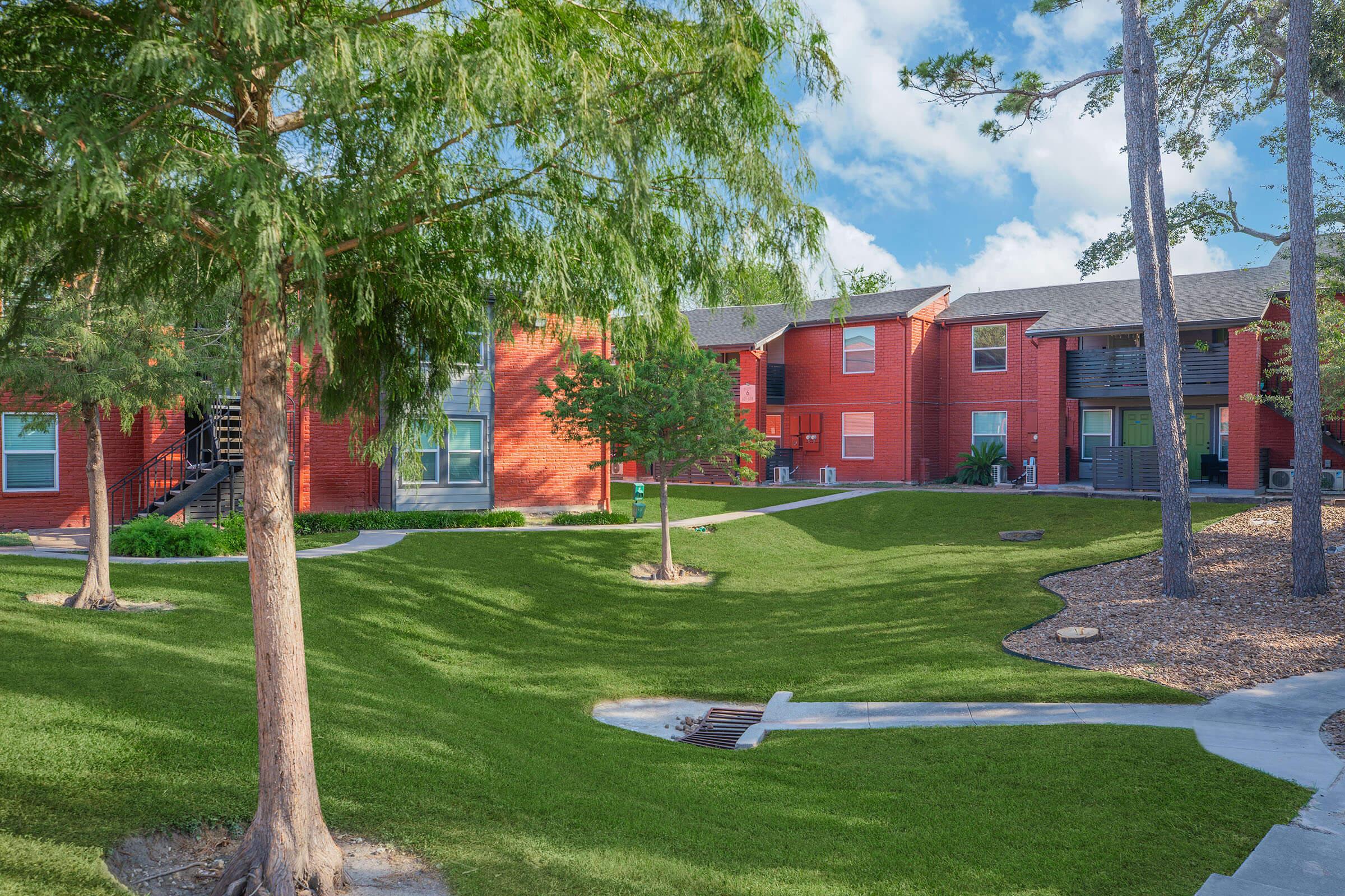 a large lawn in front of a house