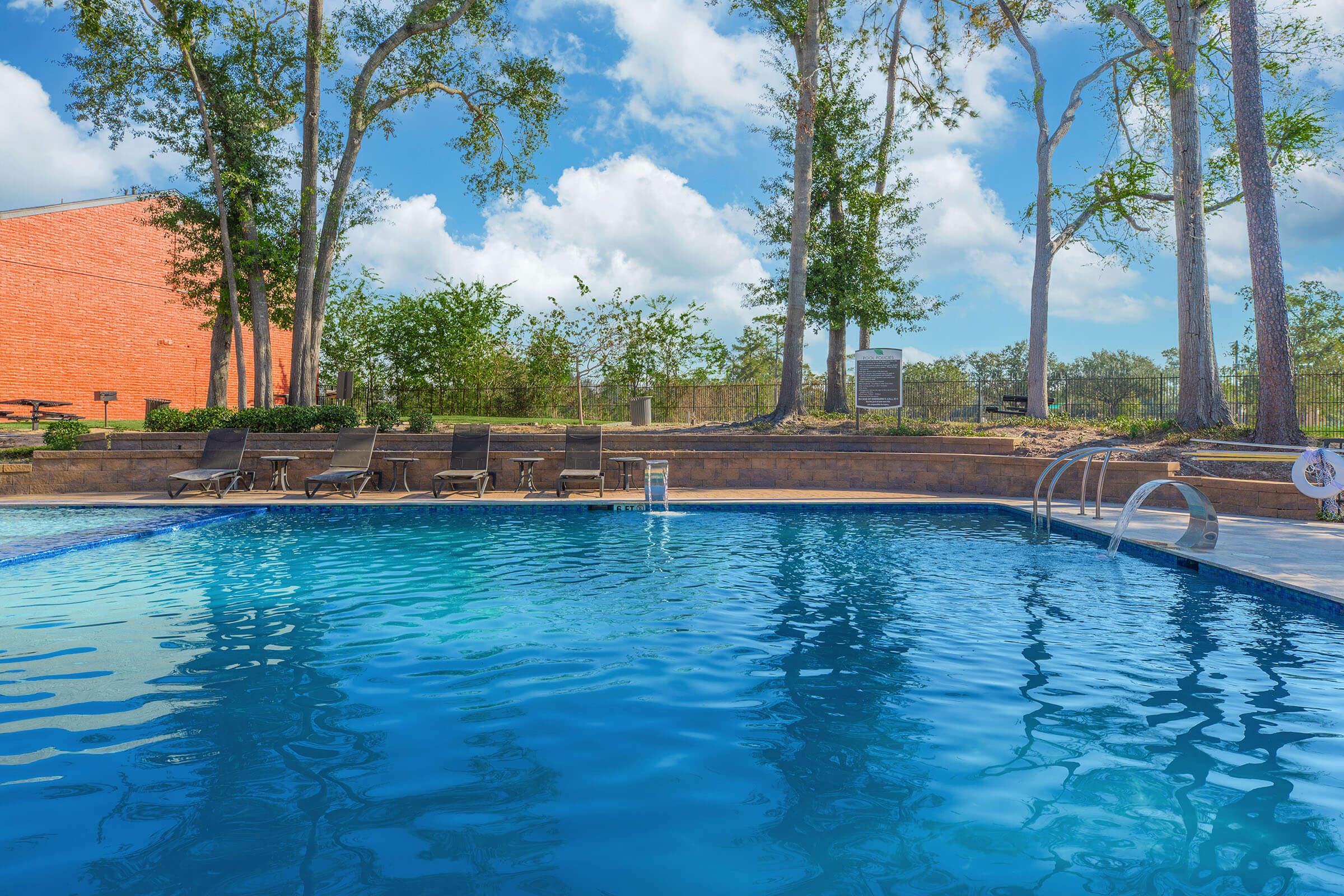 a pool next to a body of water