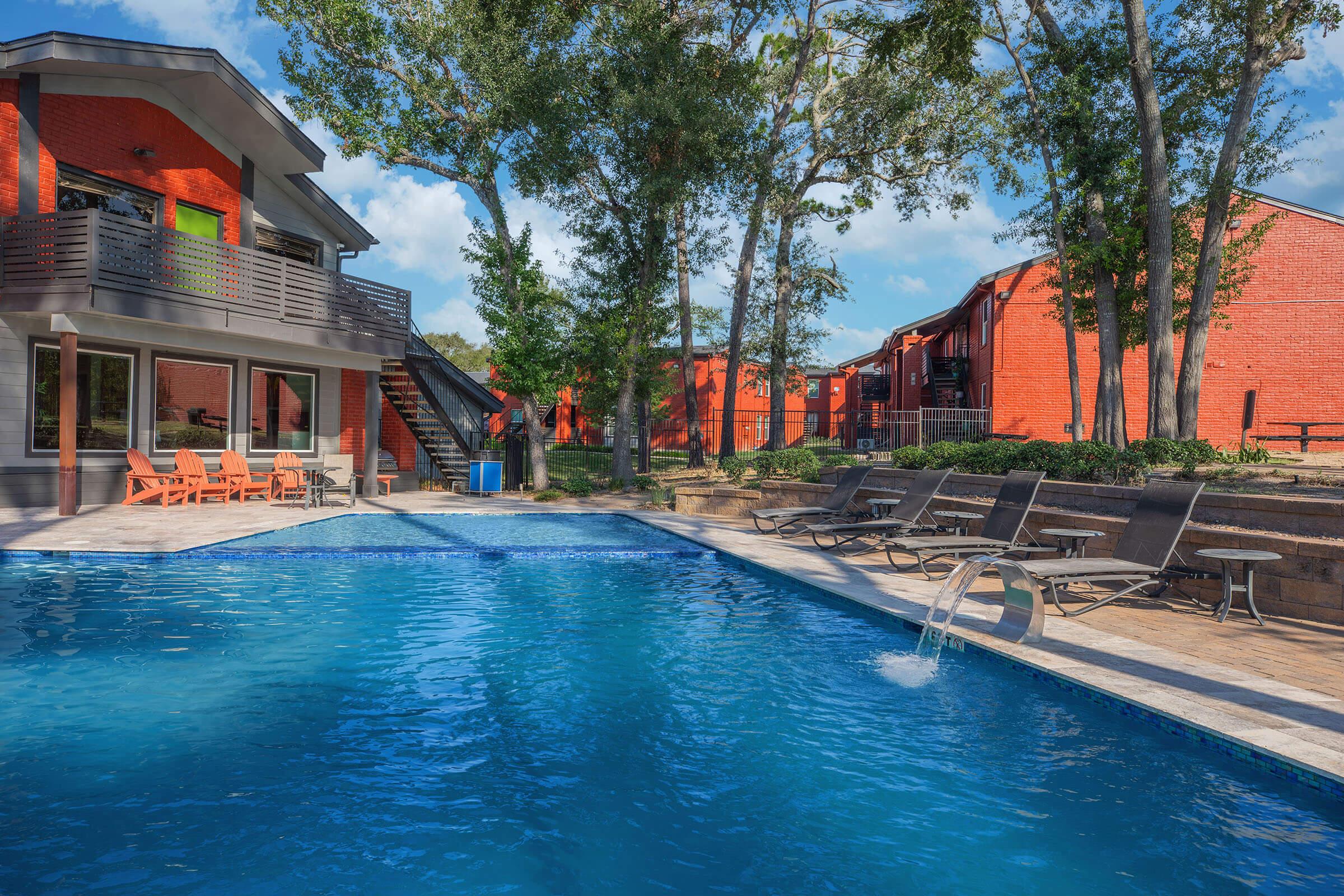 a house with a large pool of water