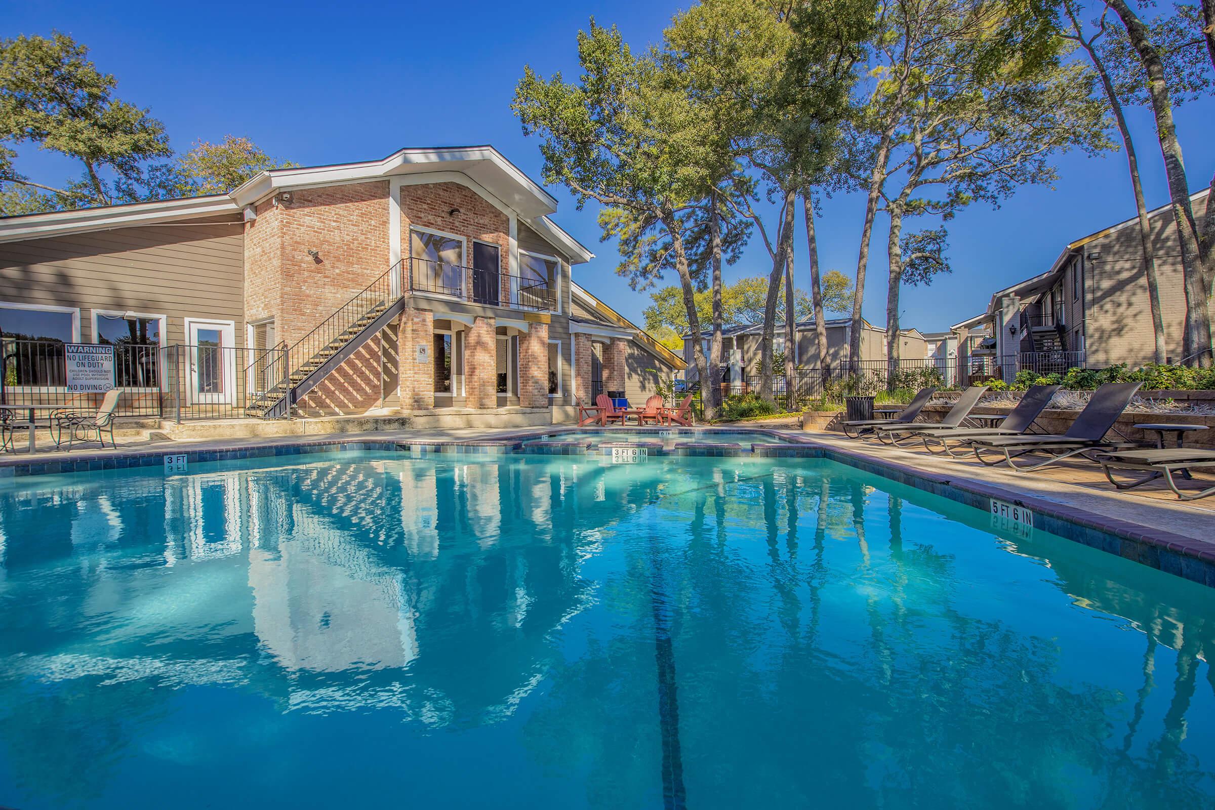 a house with a large pool of water