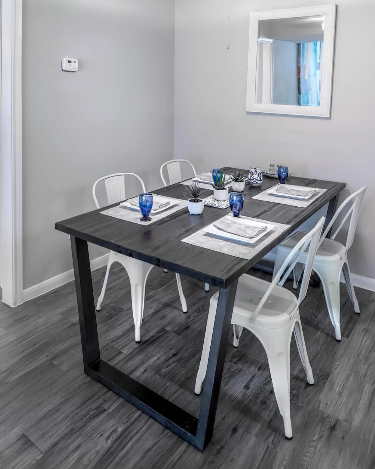 a chair sitting in front of a wooden table