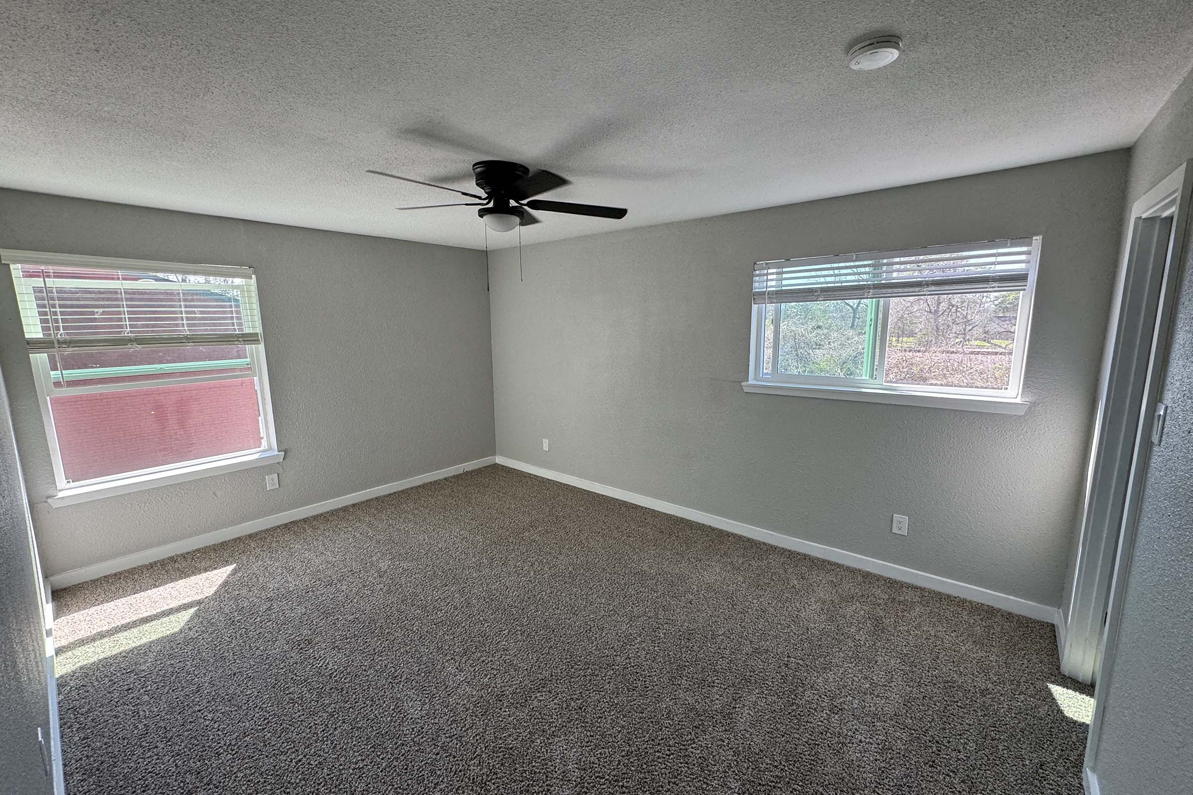 a room with a sink and a window