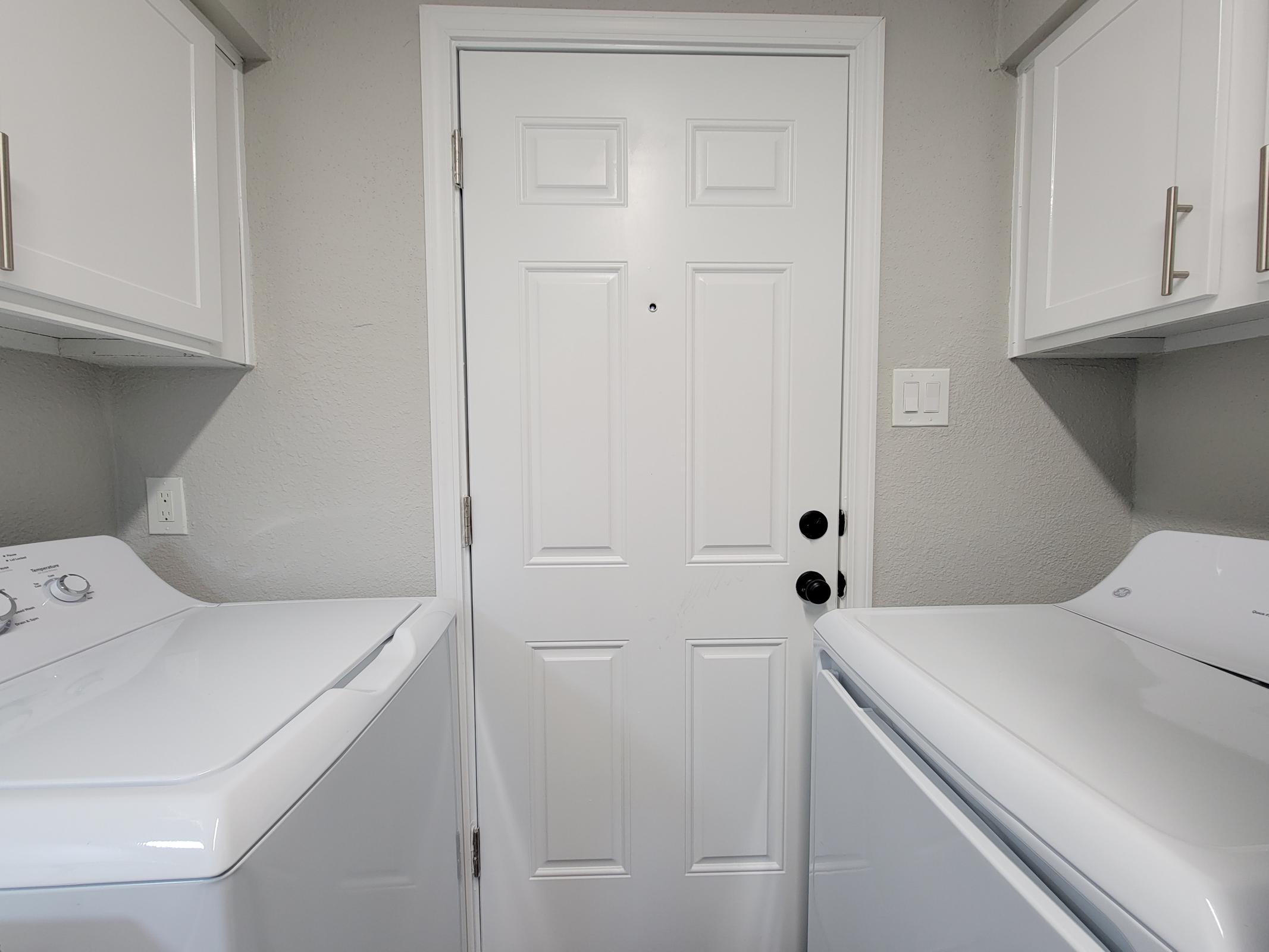 a kitchen with a sink and a window