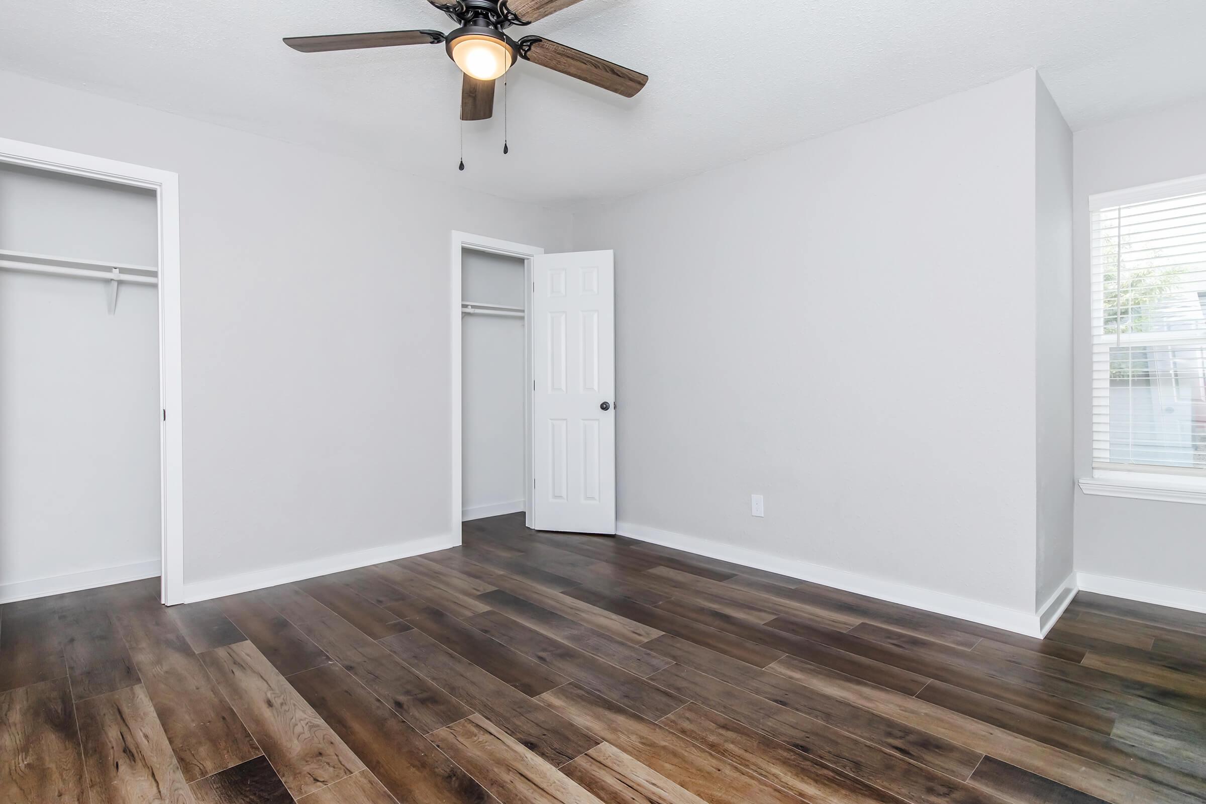 a kitchen with a wood floor