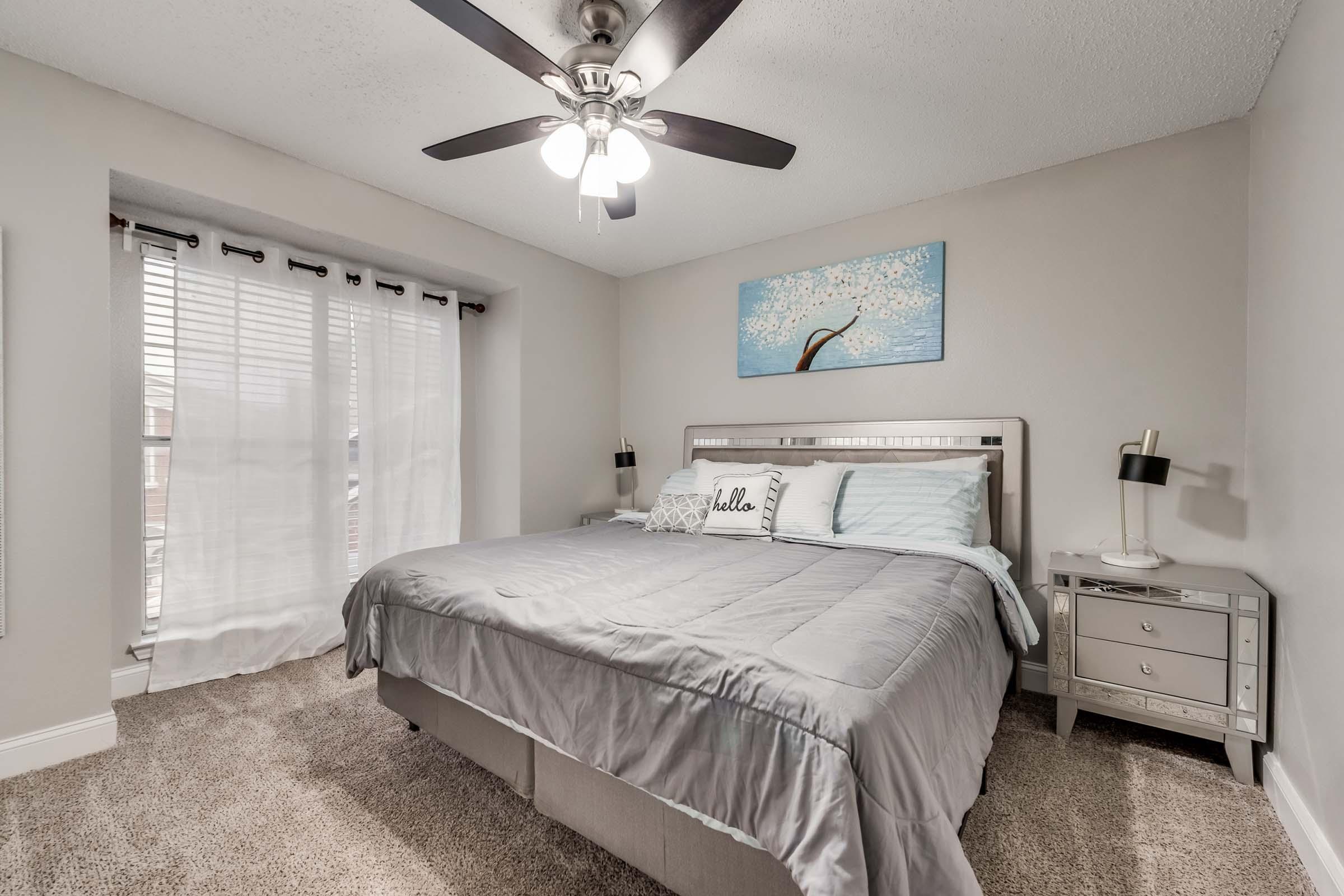 a bedroom with a bed in a hotel room