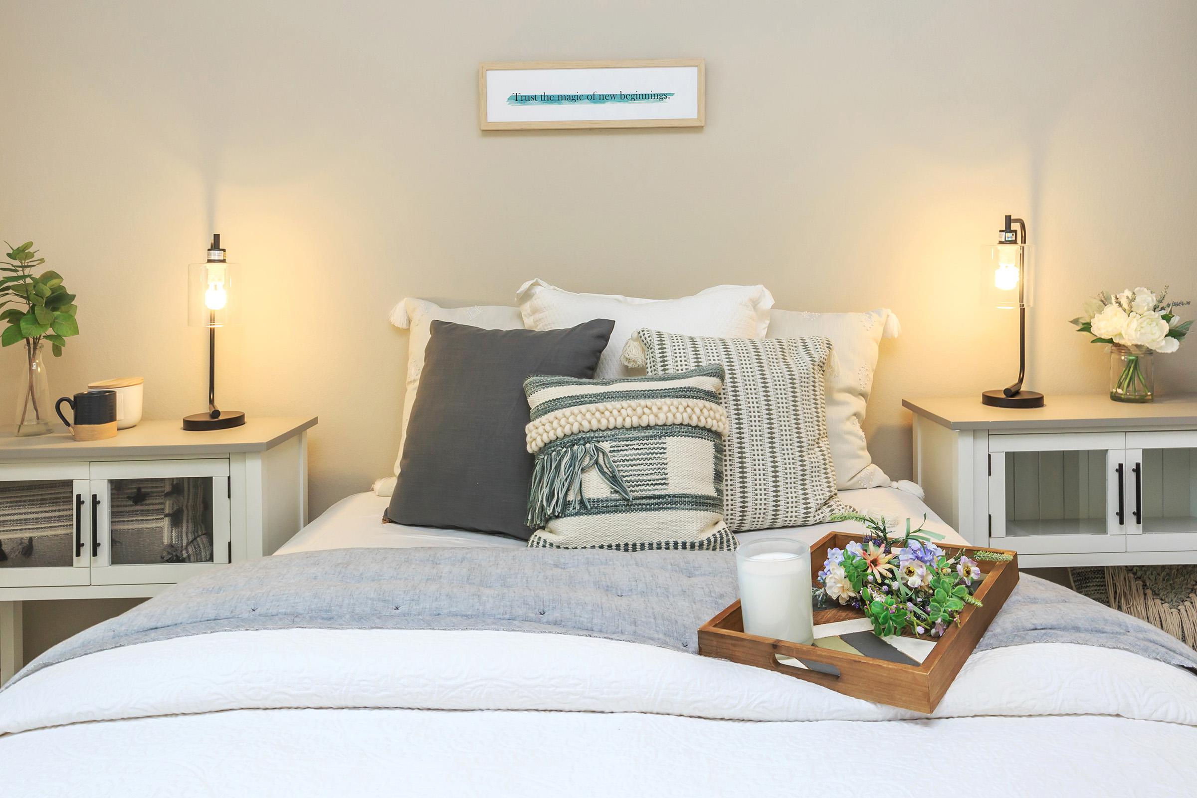 a bedroom with a bed in a room