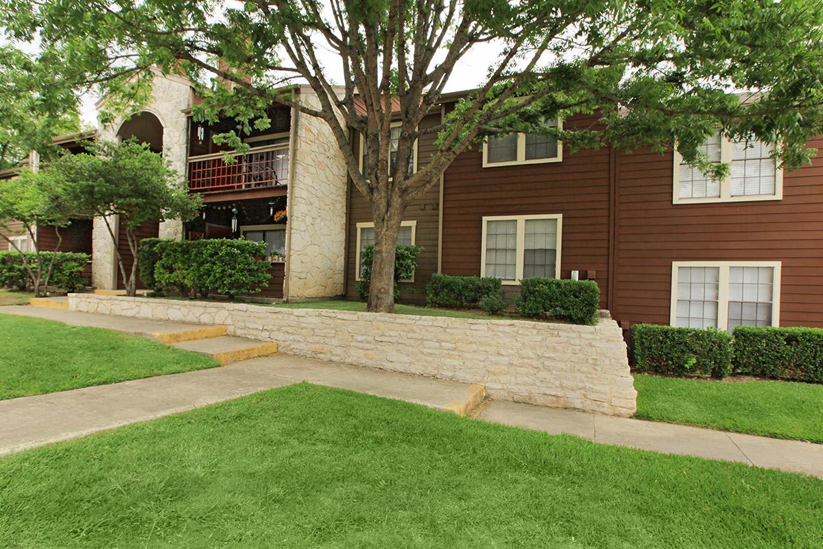 a large lawn in front of a house