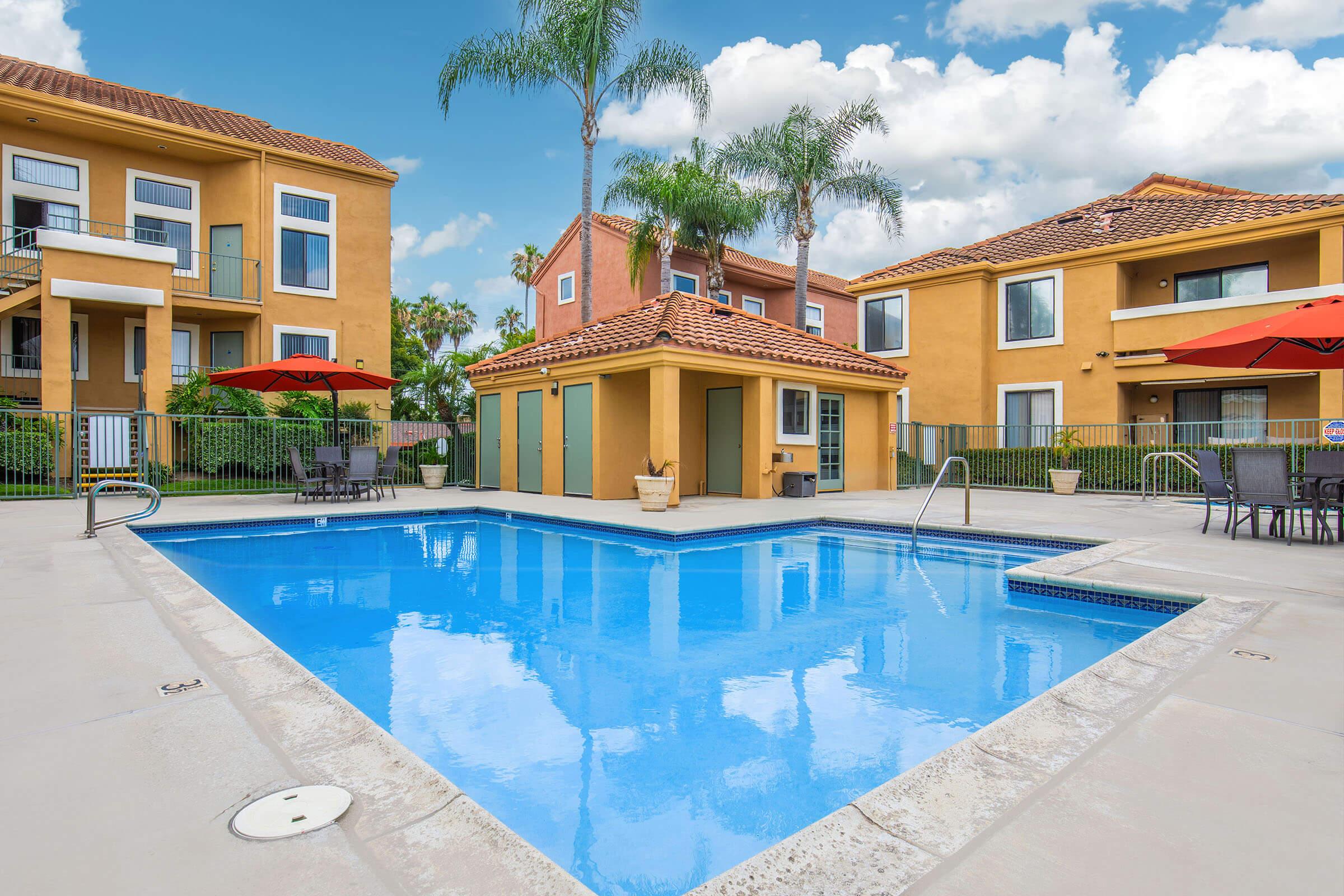 a house with a large pool of water