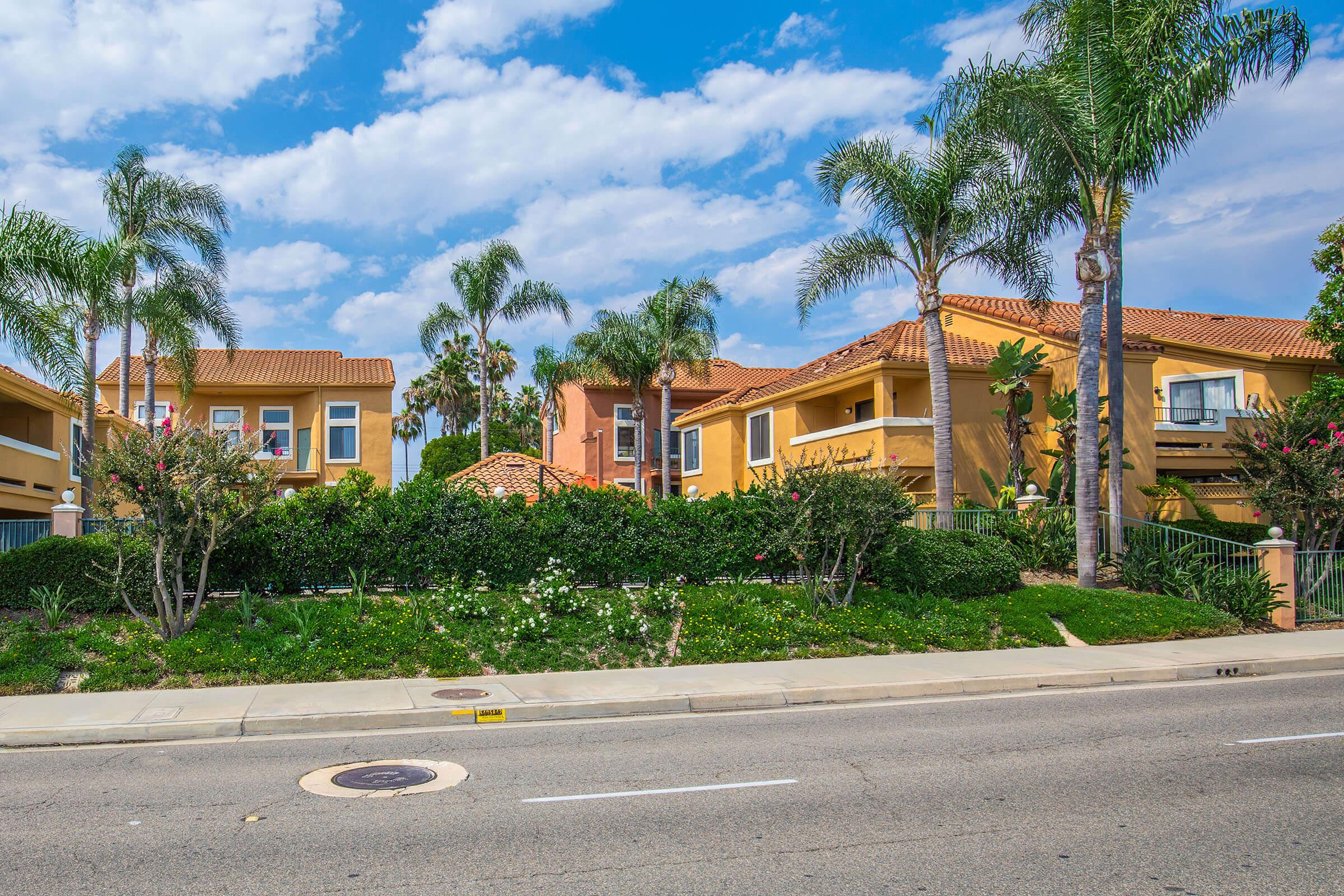 a close up of a street in front of a house