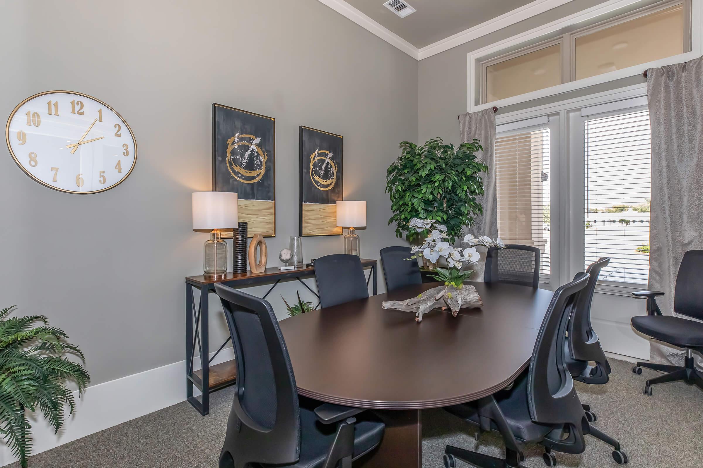 a living room with a leather chair