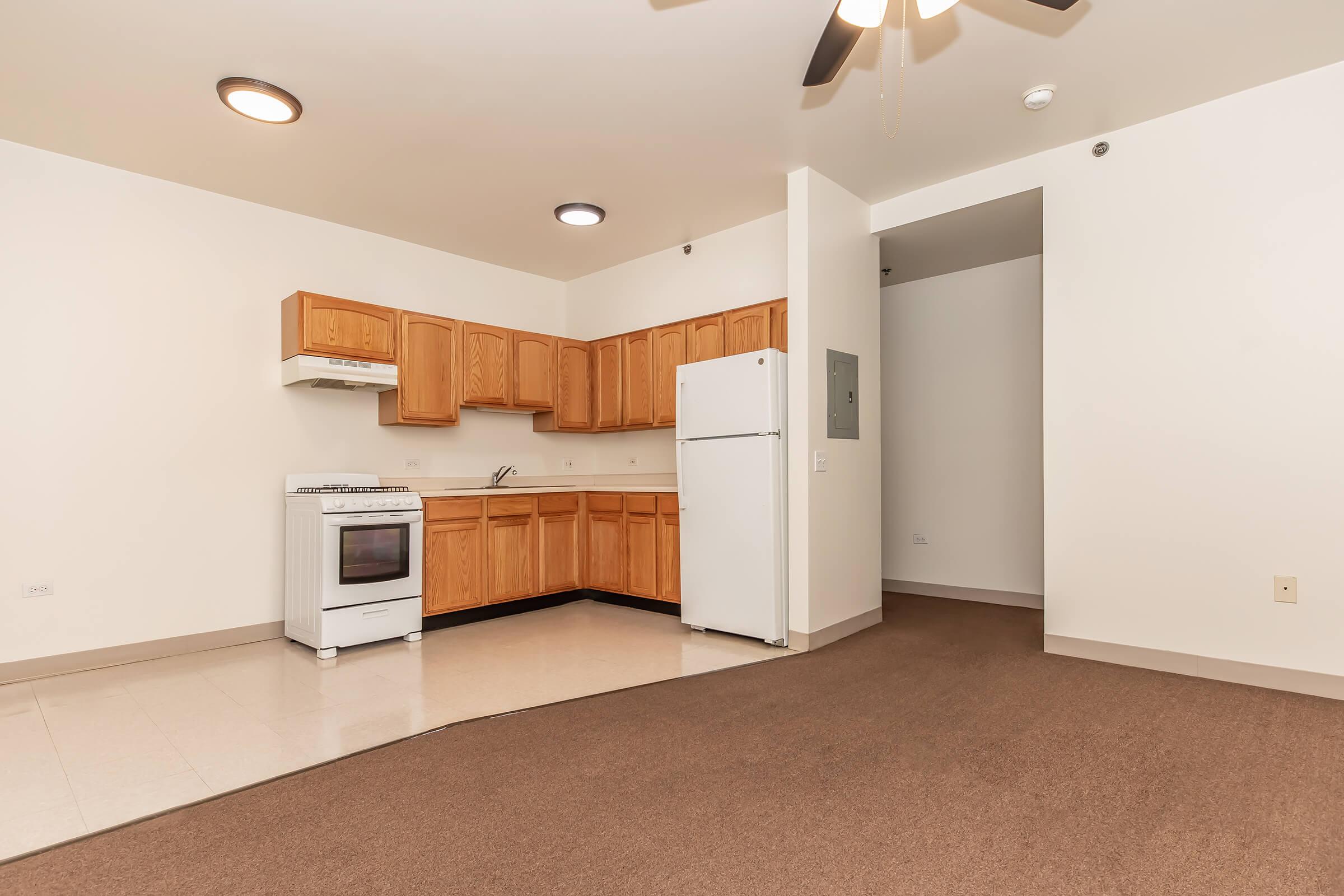 a kitchen with a tile floor