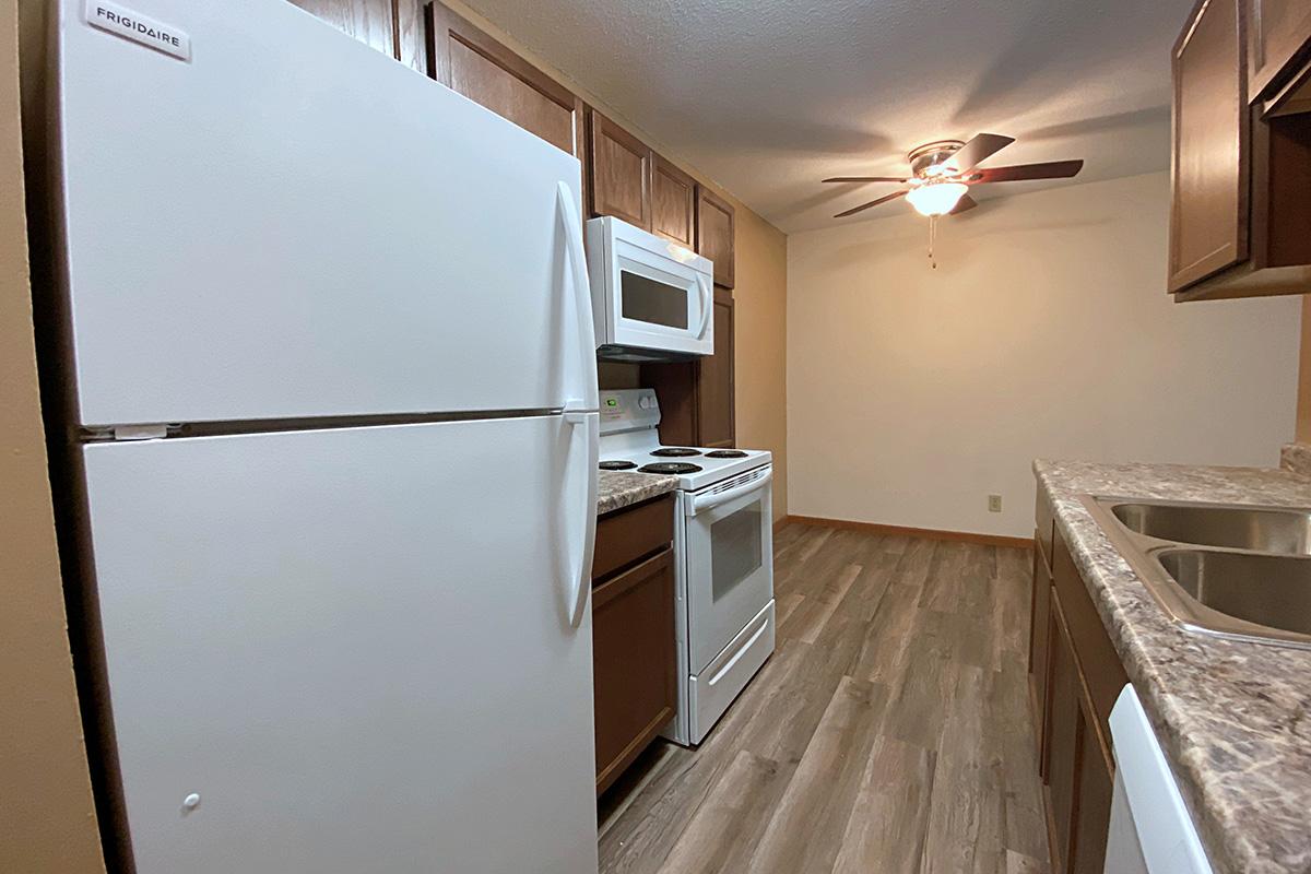 a stainless steel refrigerator in a kitchen