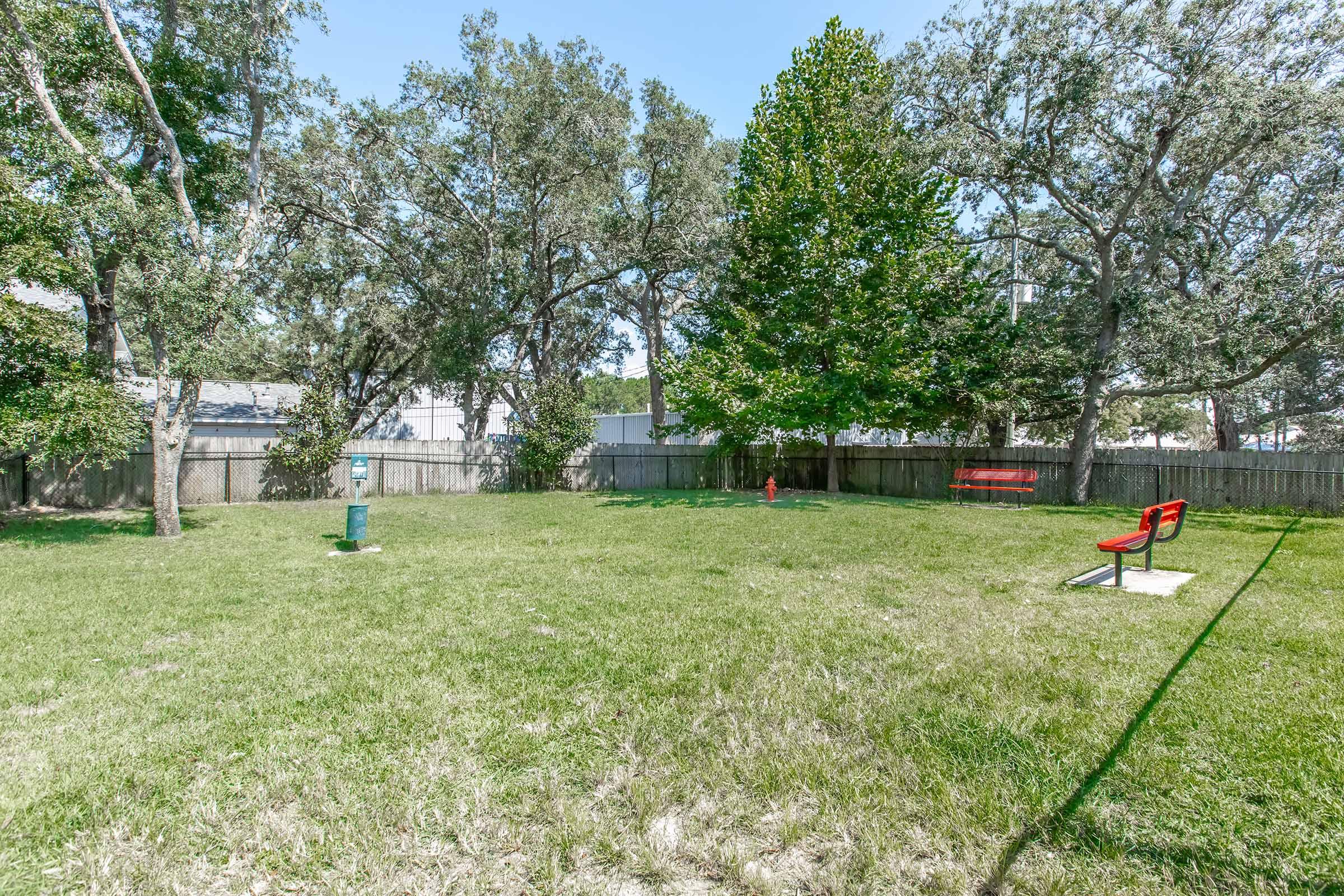 a fire hydrant in the grass