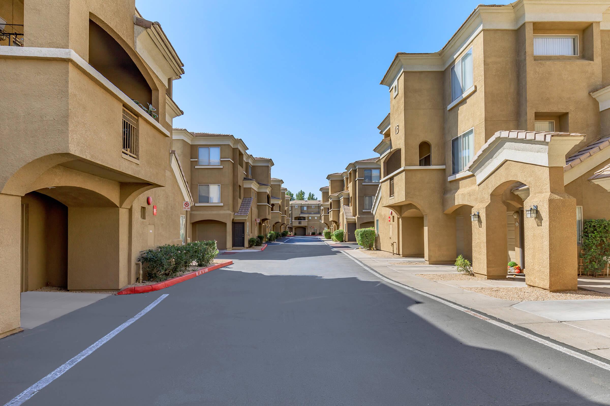 a close up of a street in front of a building