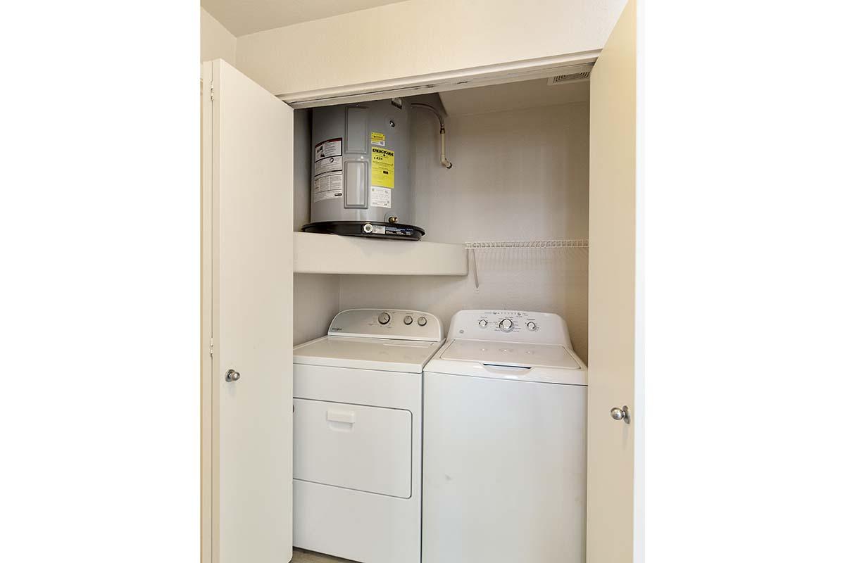 a stove top oven sitting inside of a refrigerator