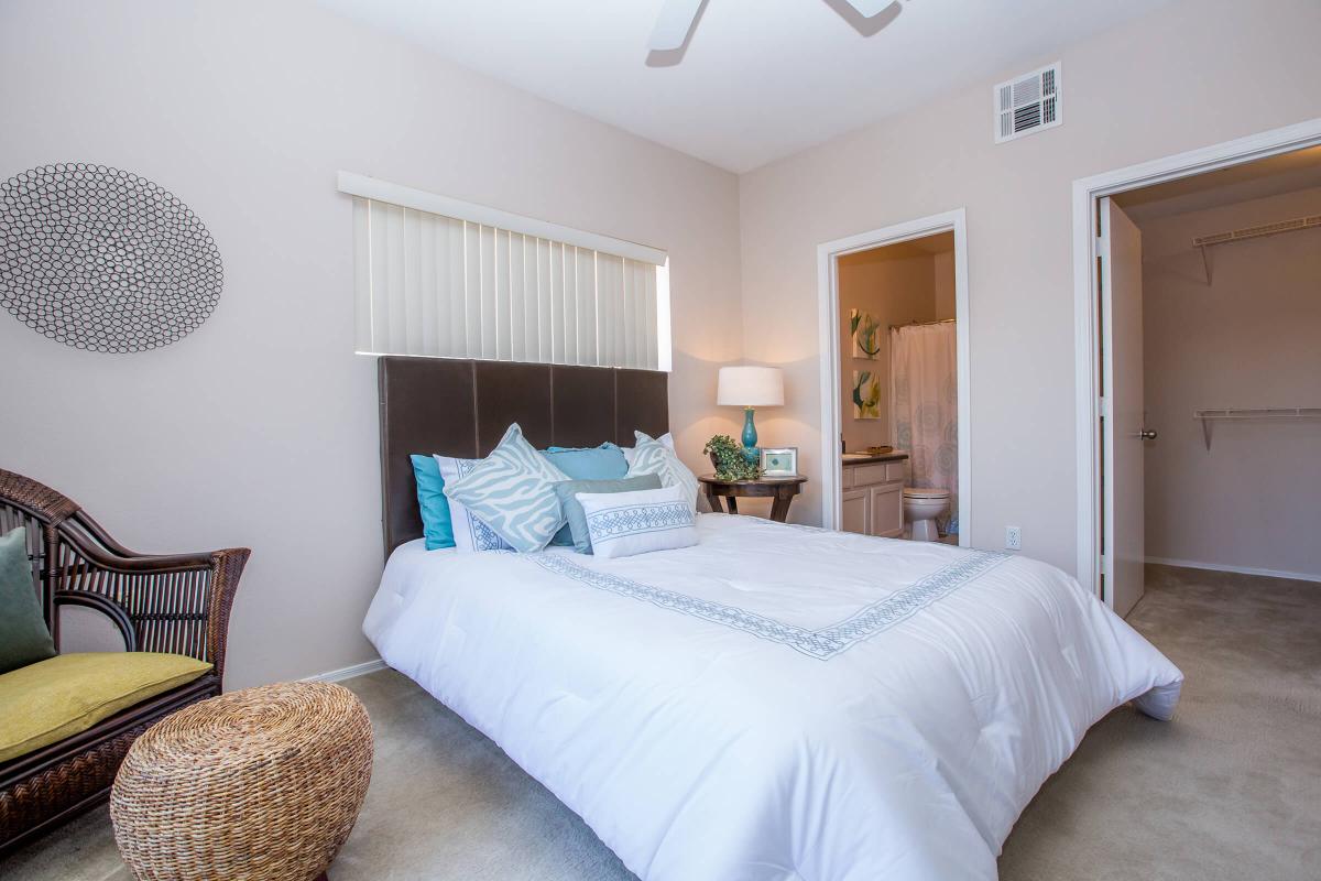a bedroom with a bed in a hotel room