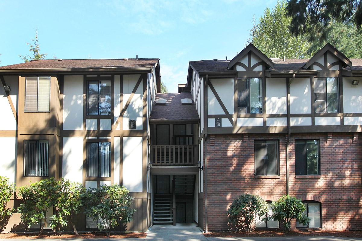 a house with trees in the background