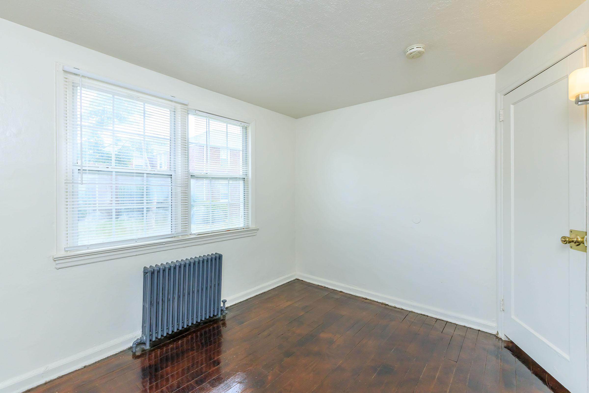 a living room next to a window