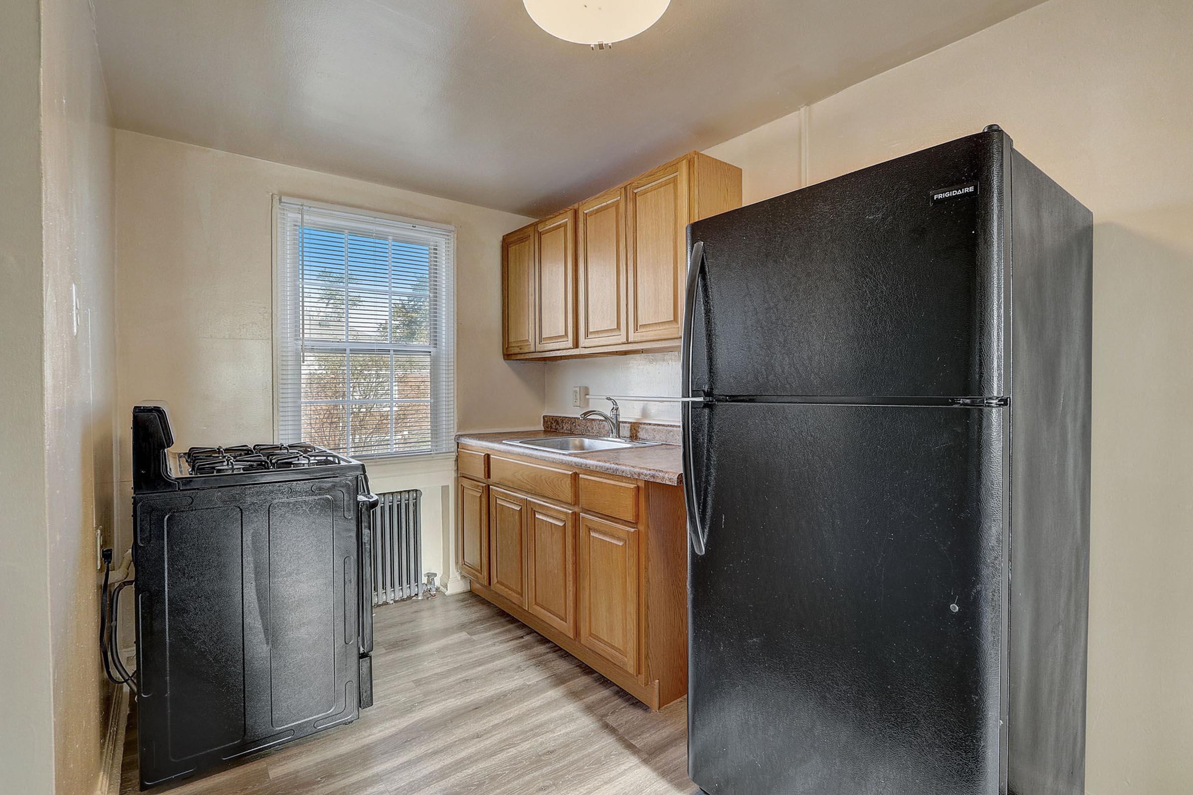 a stainless steel refrigerator in a kitchen