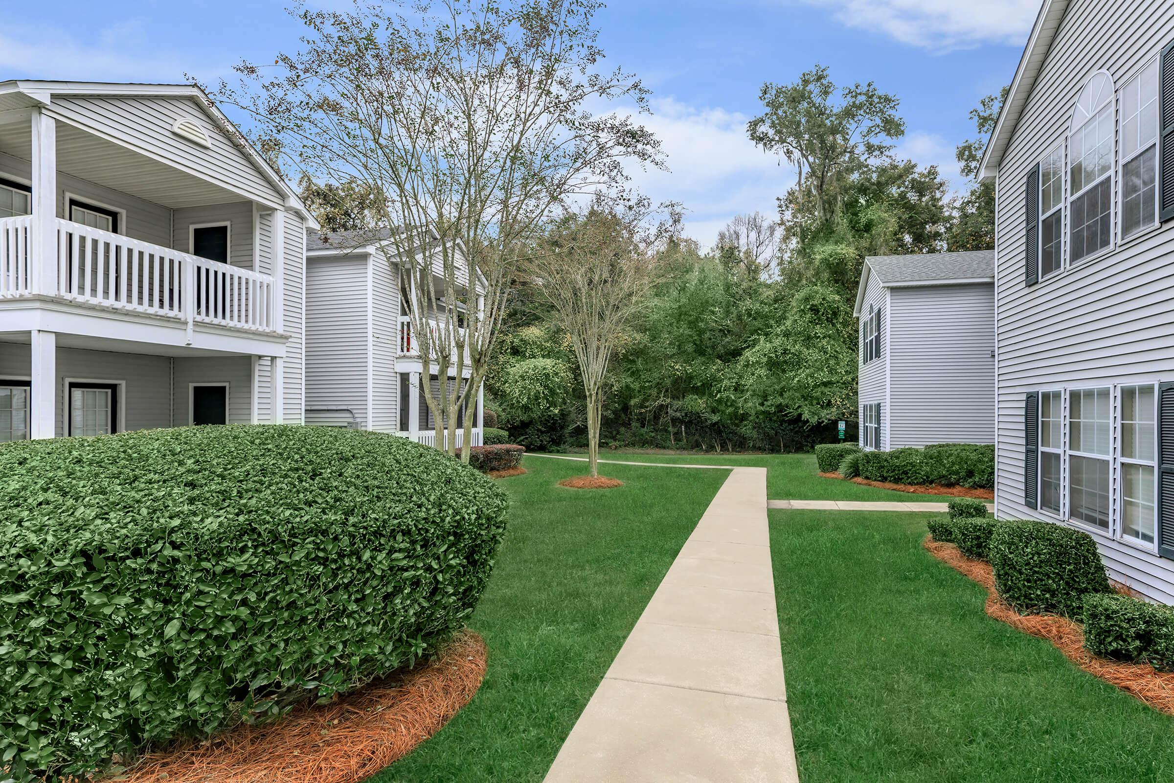 a large lawn in front of a house