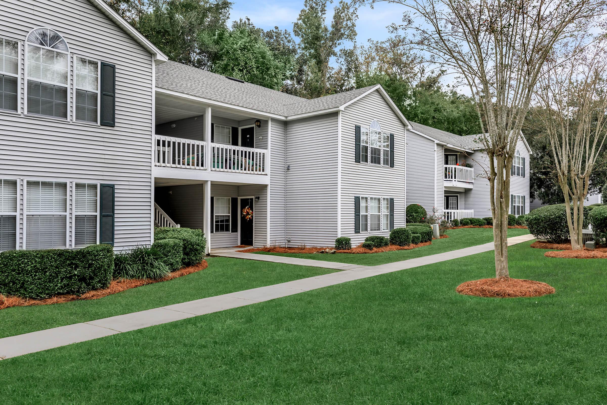 a large lawn in front of a house