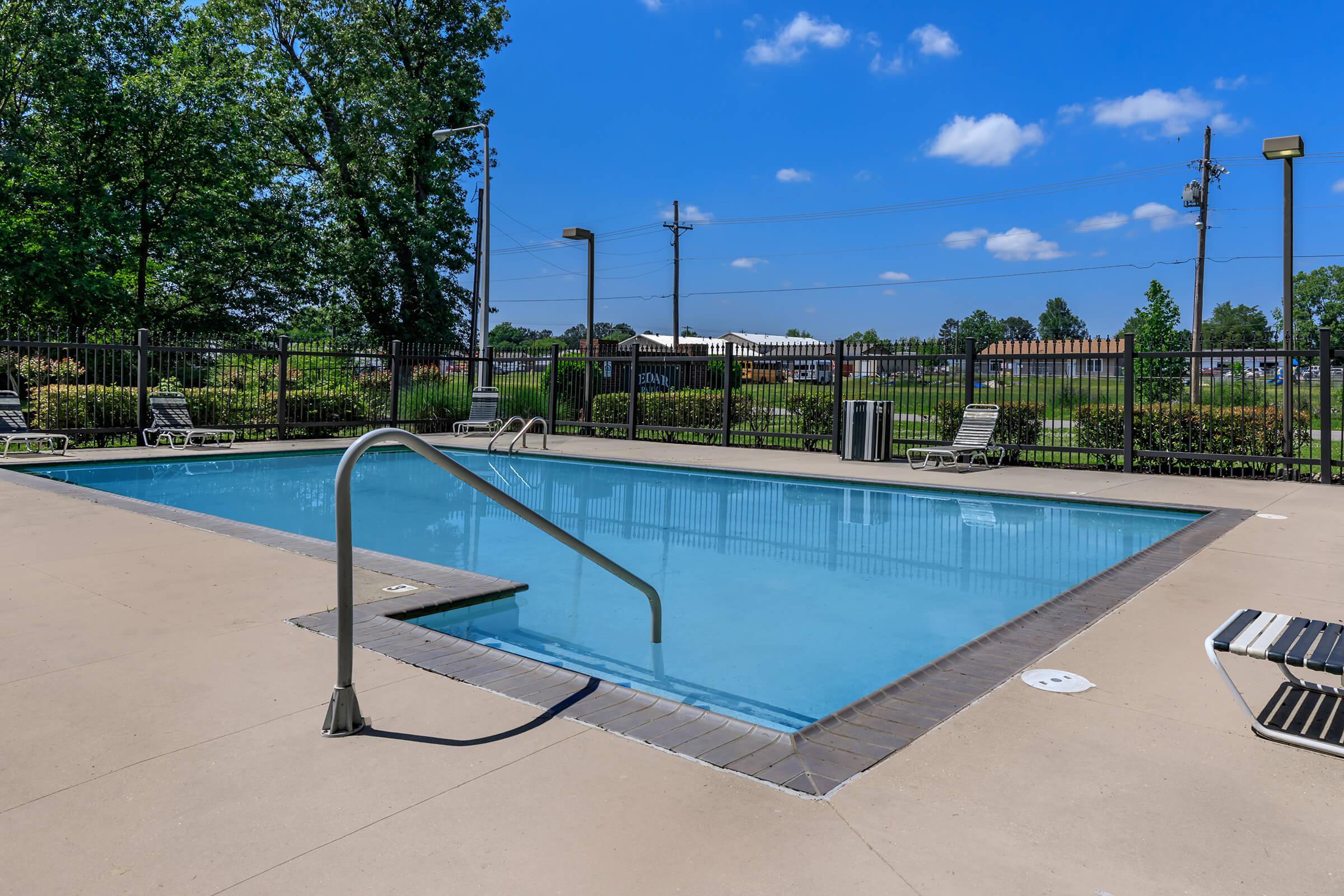 a pool next to a body of water