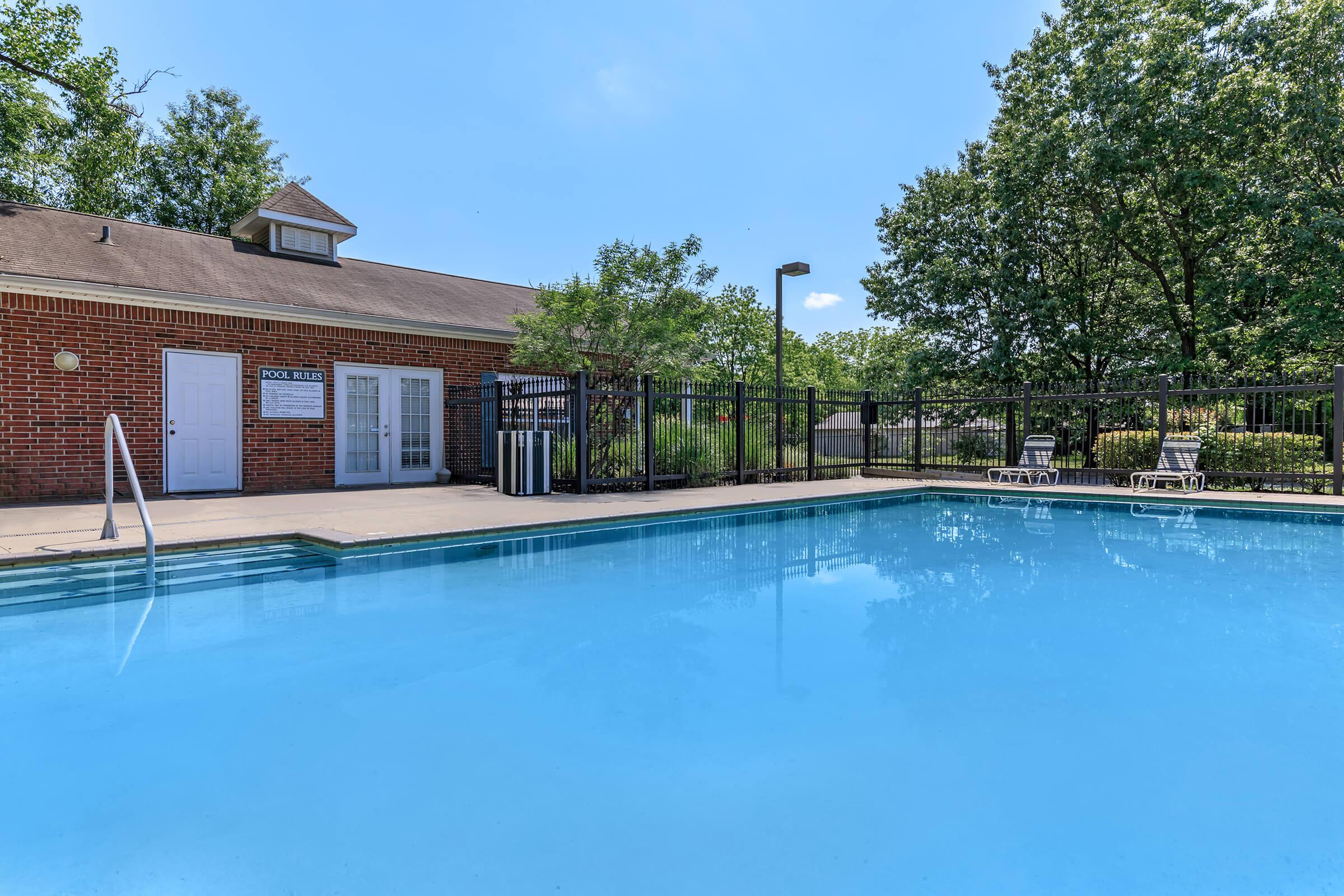 a house with a large pool of water