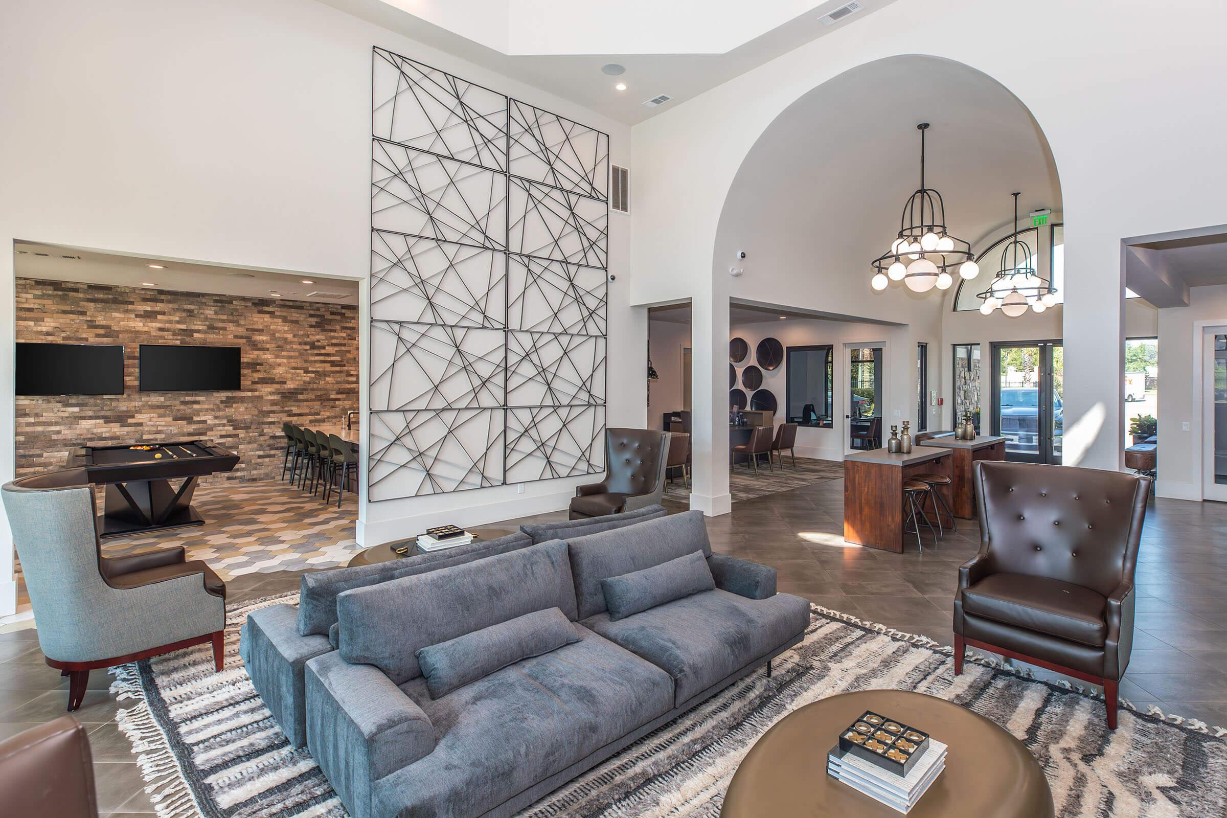 a living room filled with furniture and a fire place