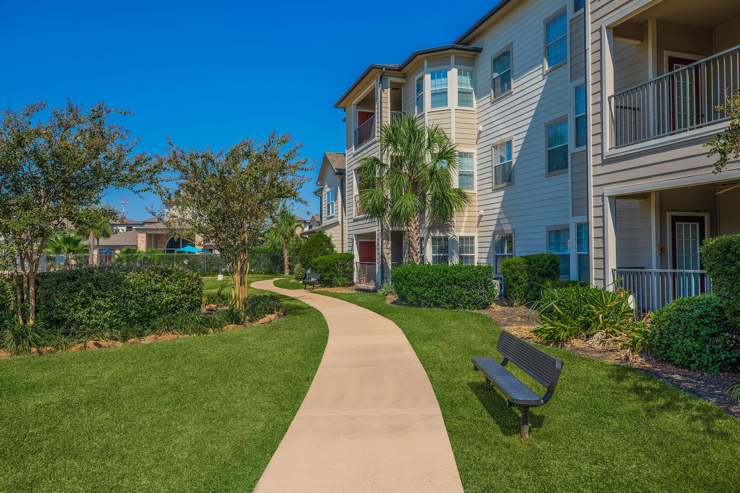 a large lawn in front of a building