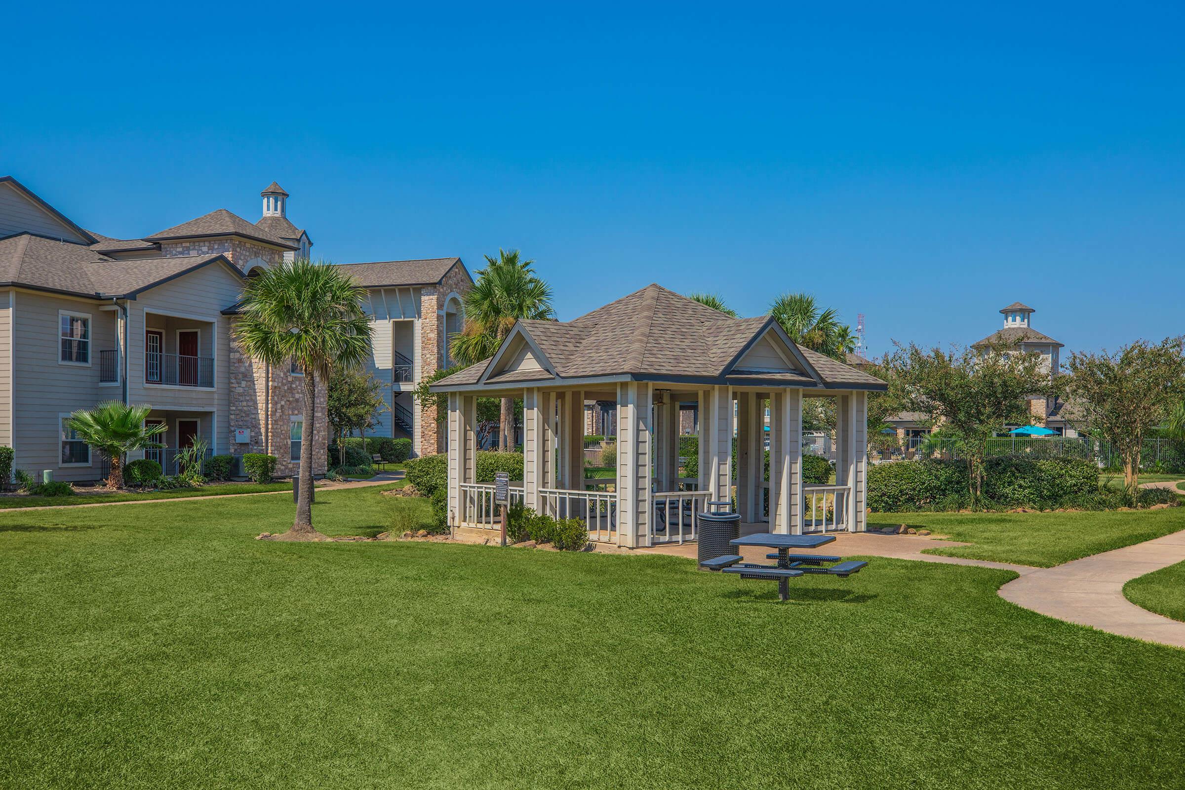 a large lawn in front of a house