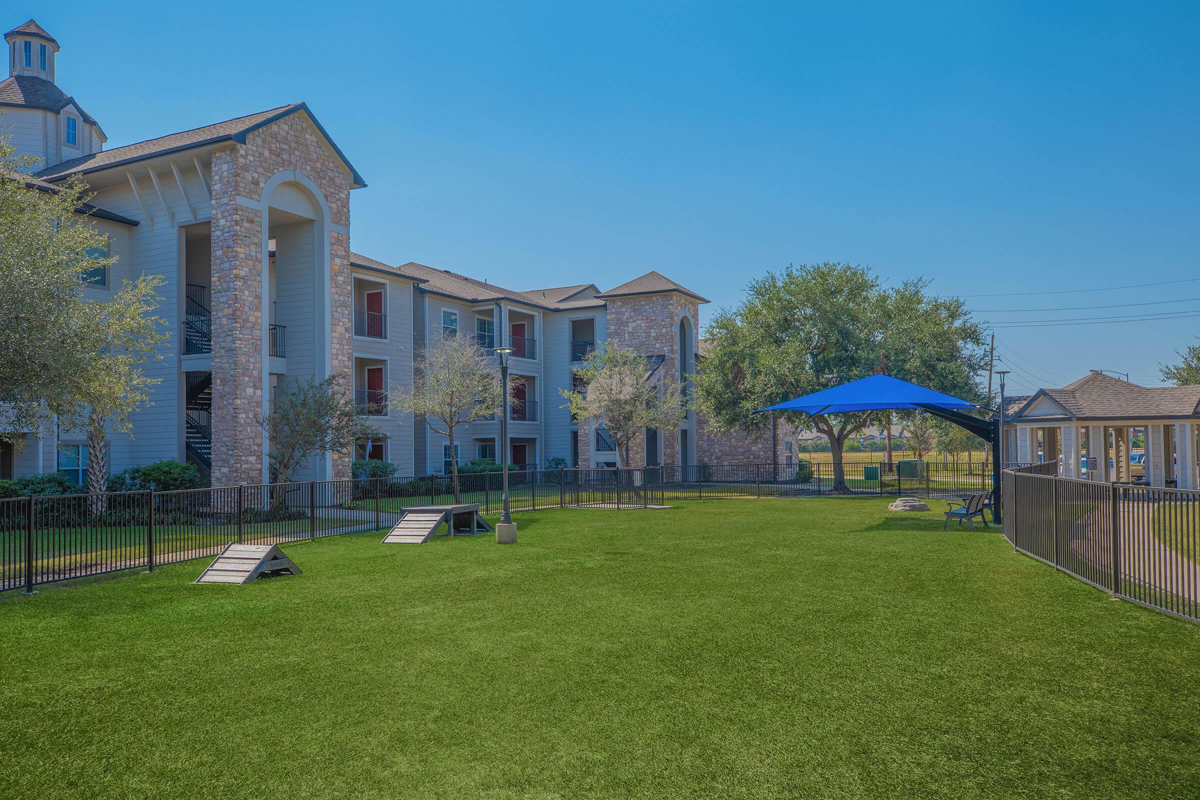 a large lawn in front of a house