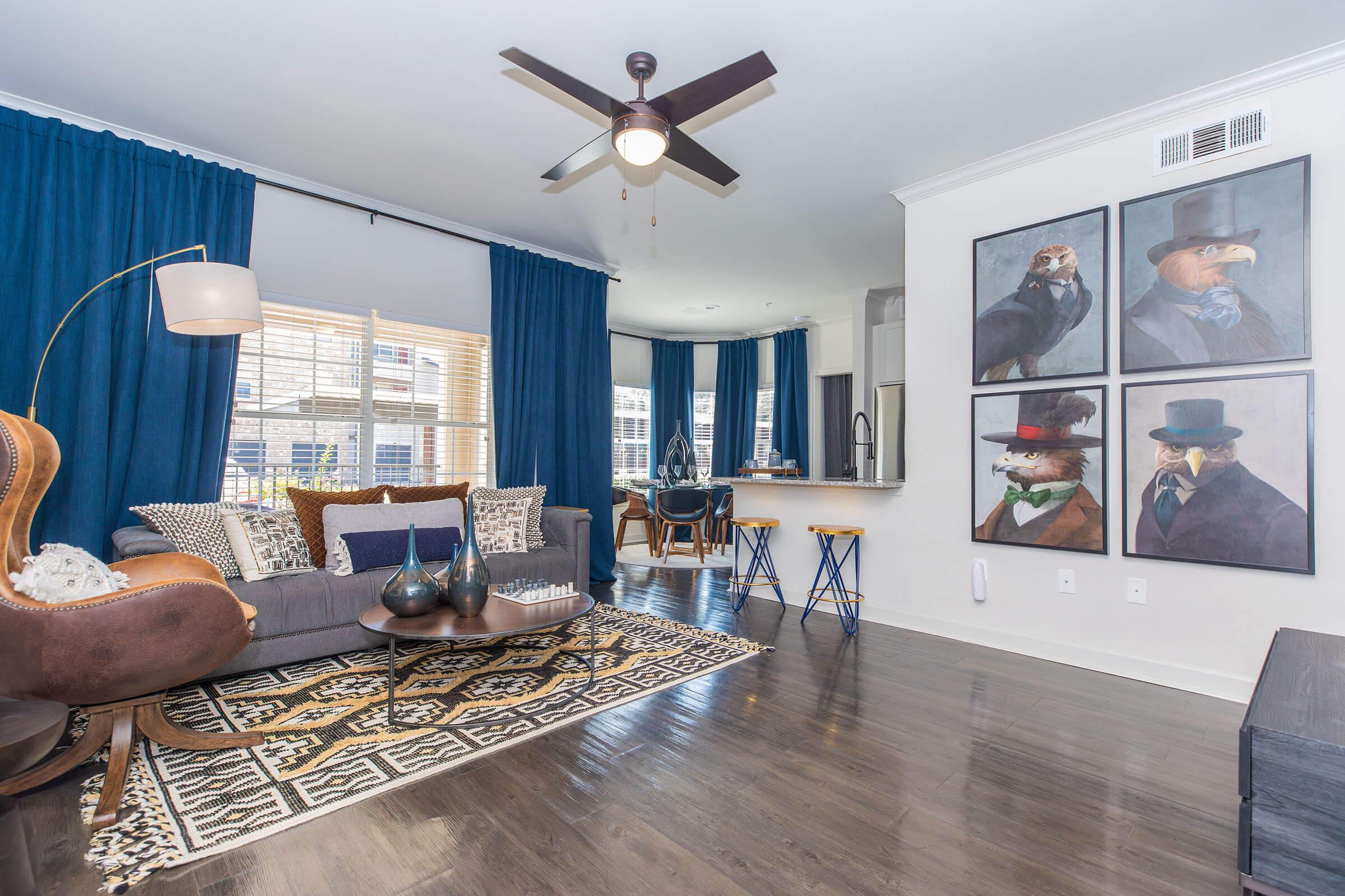 a living room filled with furniture and a fireplace