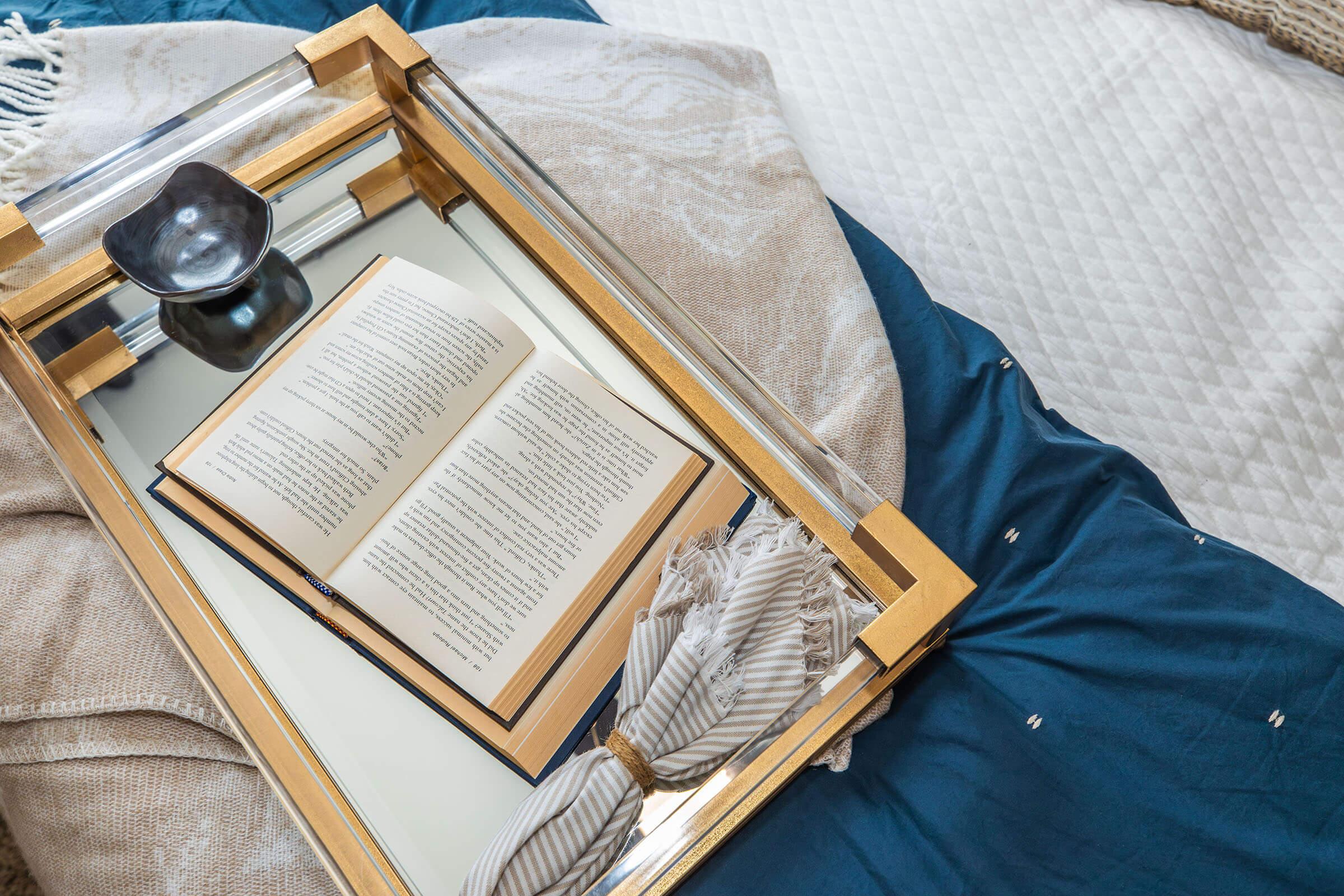 a book sitting on top of a bed