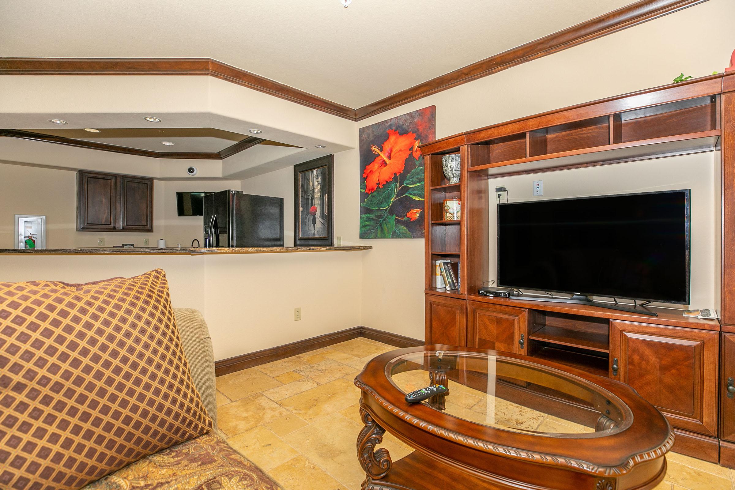 a living room filled with furniture and a fireplace