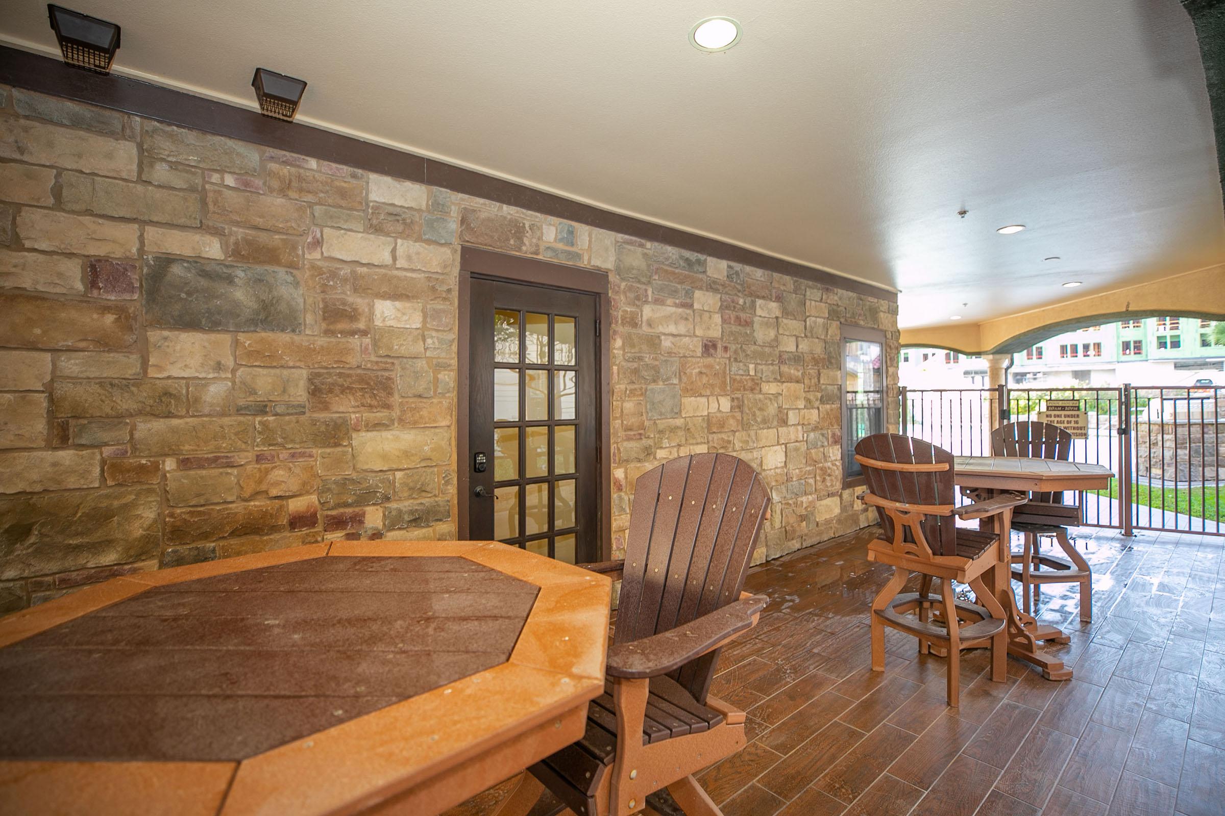 a living room filled with furniture and a fireplace