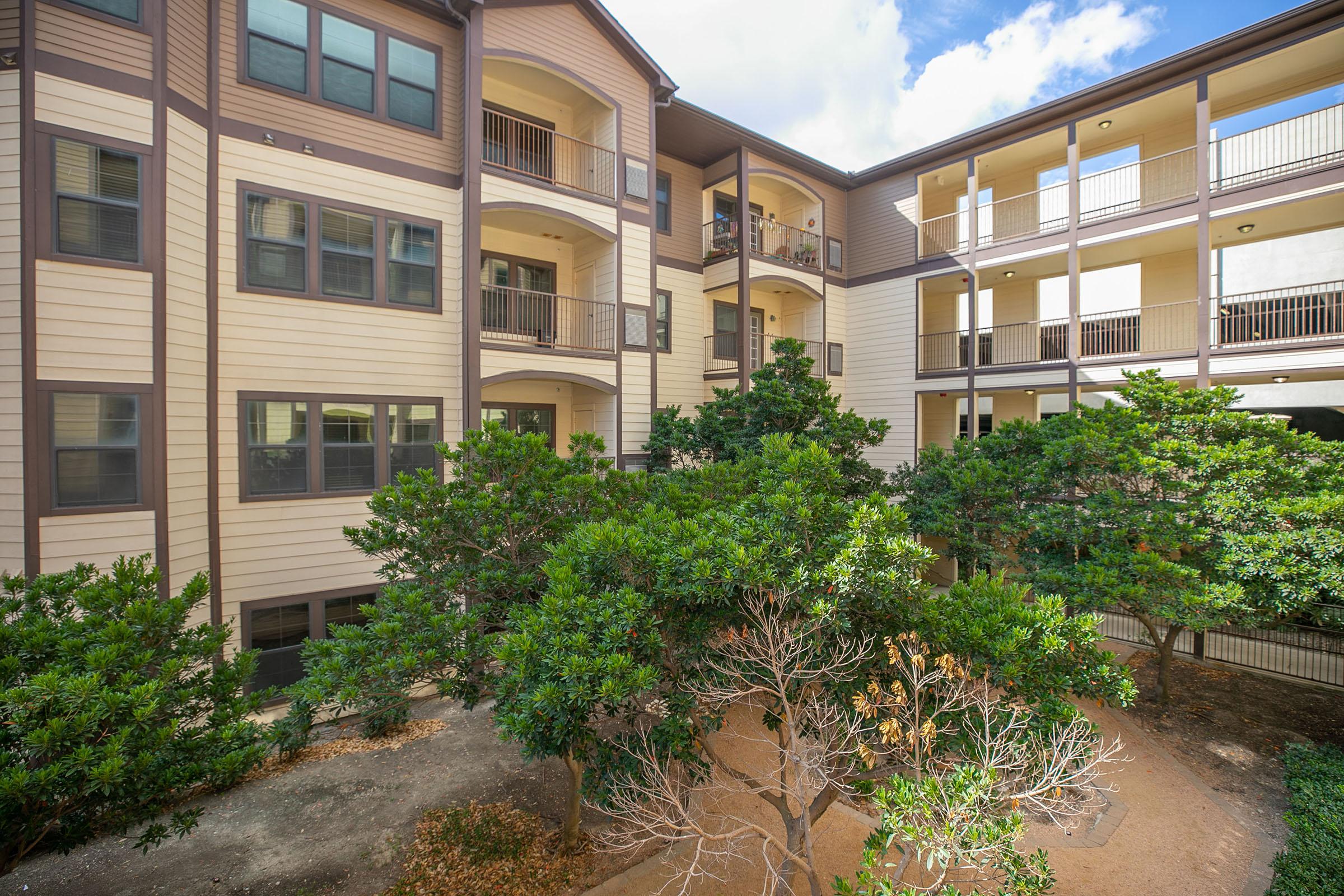 a garden in front of a building