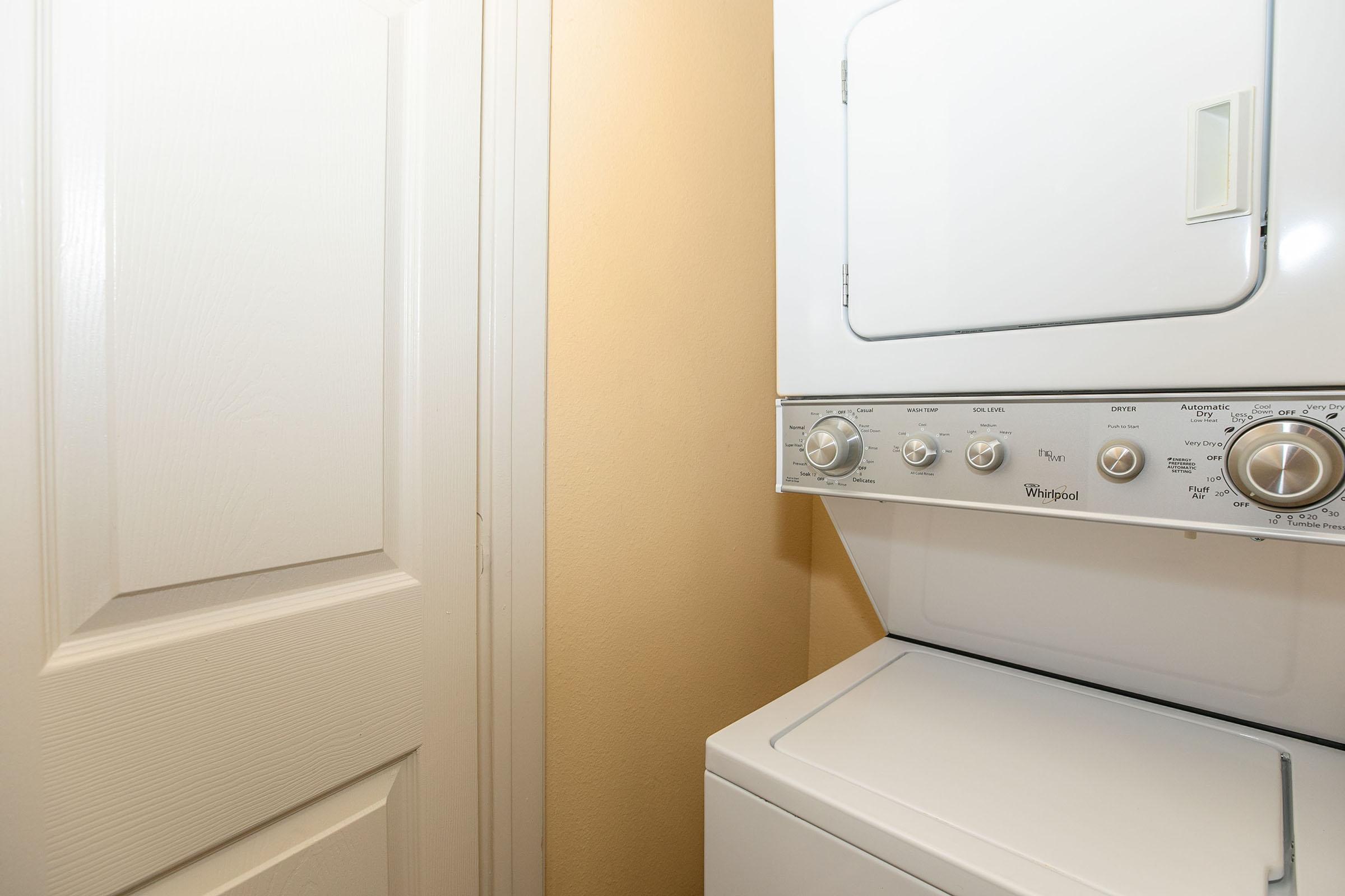 a microwave oven sitting on top of a door